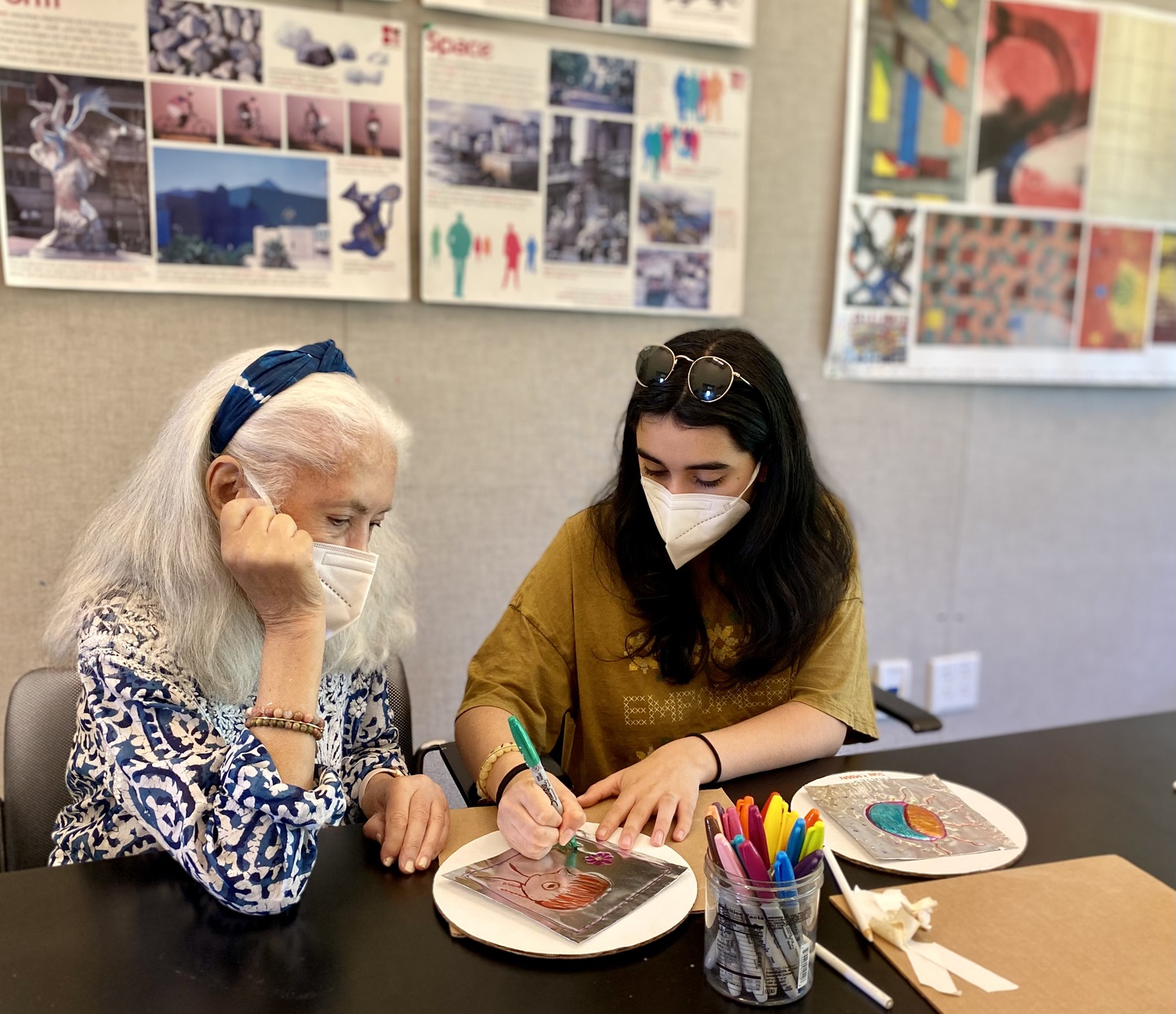 Olga Gamble and her granddaughter, Isabella, work on their art pieces during Paint at the Parrish. COURTESY PARRISH ART MUSEUM