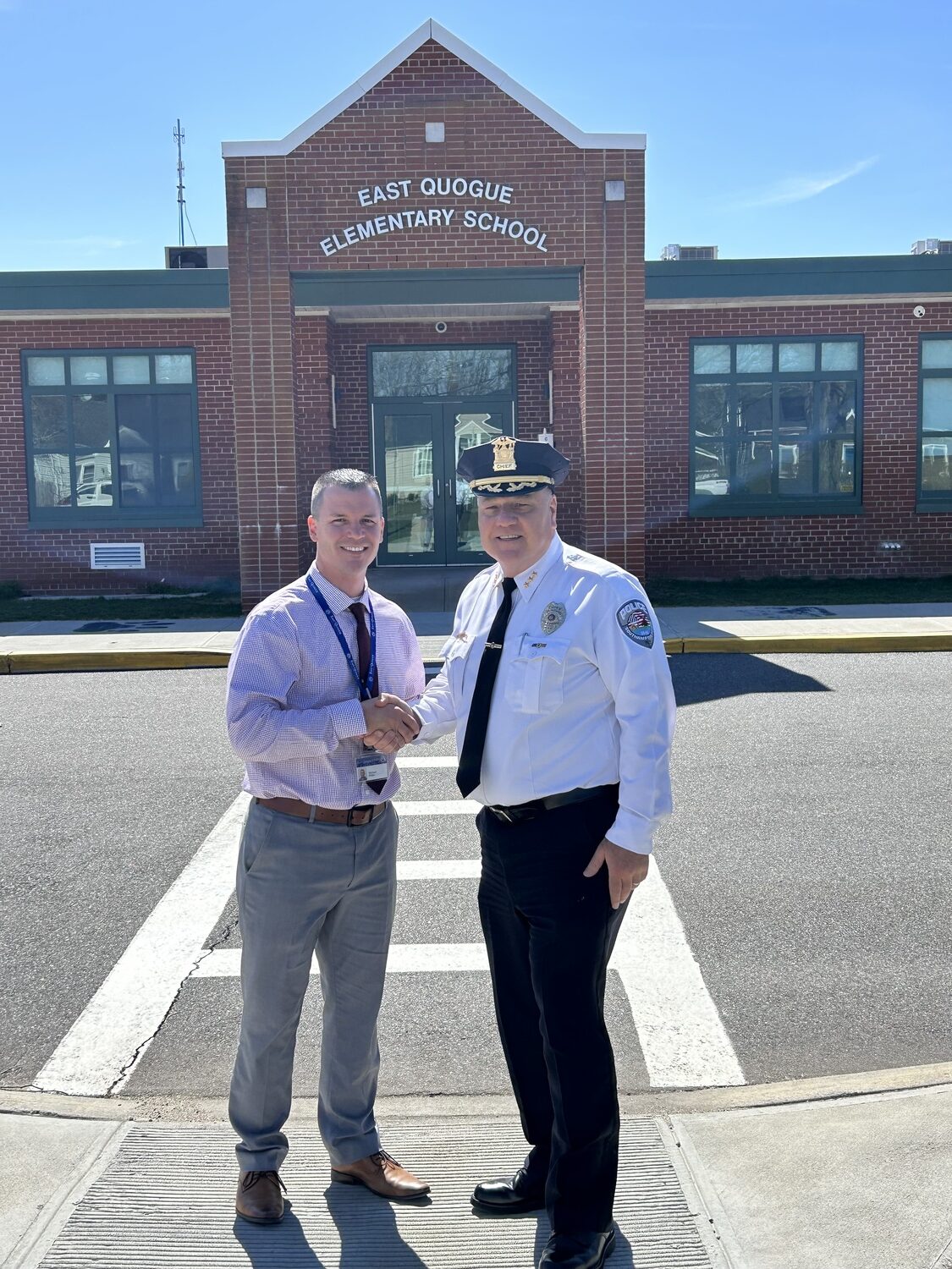 Southampton Police Department Chief Kiernan visited the East Quogue School District and Principal Michael Miller on March 25 to sign a memorandum of agreement to enhance the district’s security measures by participation in the Southampton Town Alert Domain Awareness System. In signing the agreement, the Southampton Police Department will have access to district cameras in case of an emergency. COURTESY EAST QUOGUE SCHOOL DISTRICT