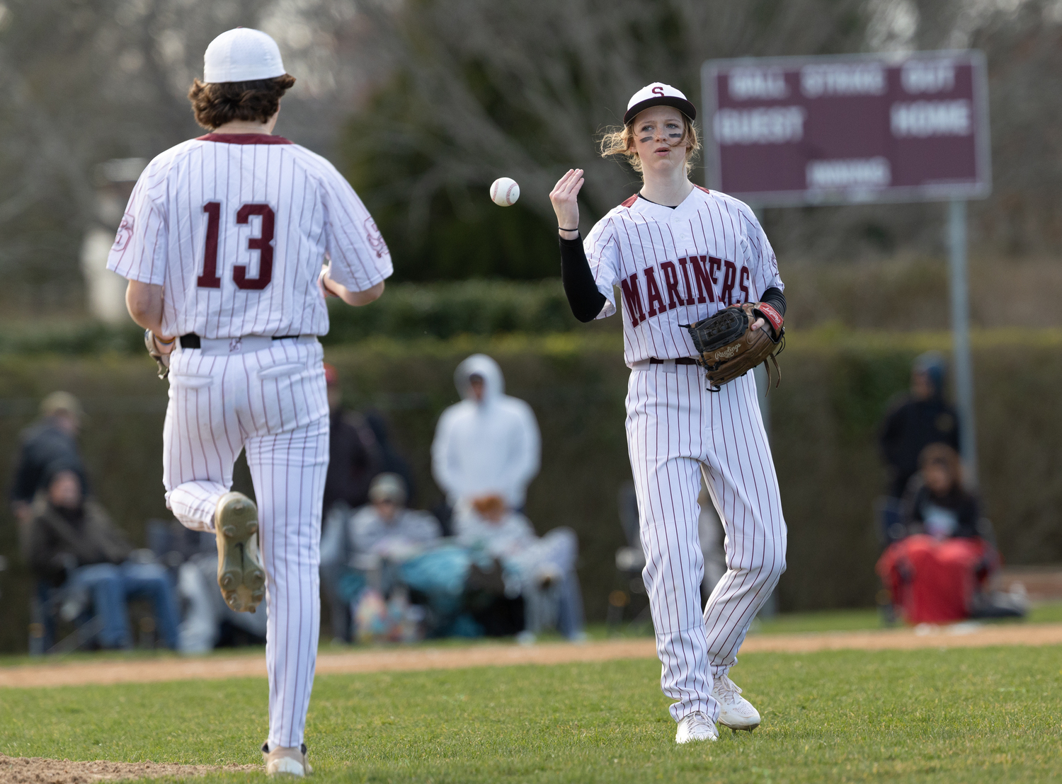 Southampton third baseman Bailey Brown tosses the ball back to pitcher Thomas Crawford.   RON ESPOSITO/SOUTHAMPTON SCHOOL DISTRICT