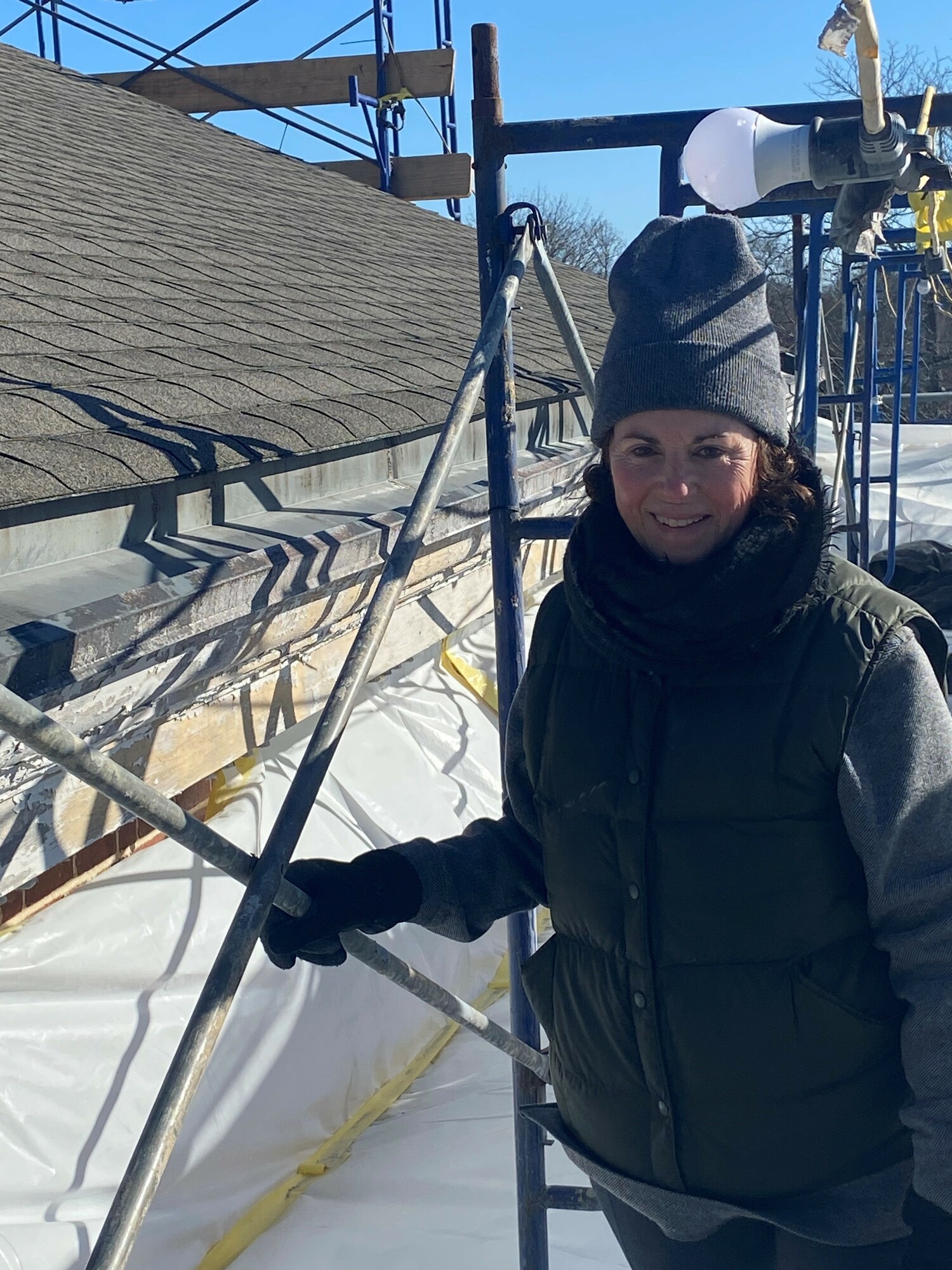 Southampton Village Deputy Mayor Gina Arresta inspecting work being done on the exterior of village hall. COURTESY SOUTHAMPTON VILLAGE