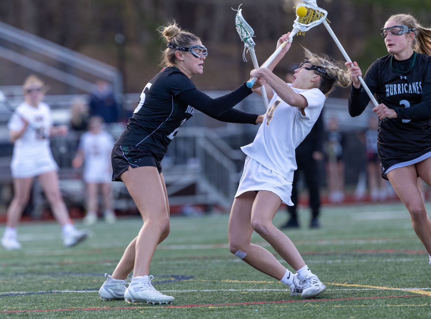 Senior defender Gabby  Wendel checks an opponent in an attempt to force a turnover. RON ESPOSITO