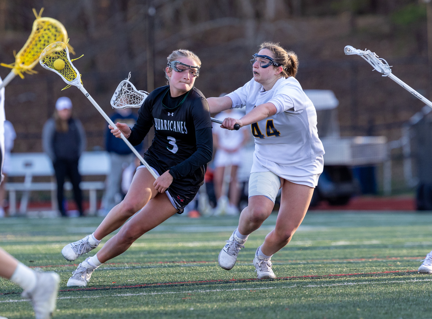 Junior midfielder Lily Graves battles an opponent as she makes her way to goal. RON ESPOSITO