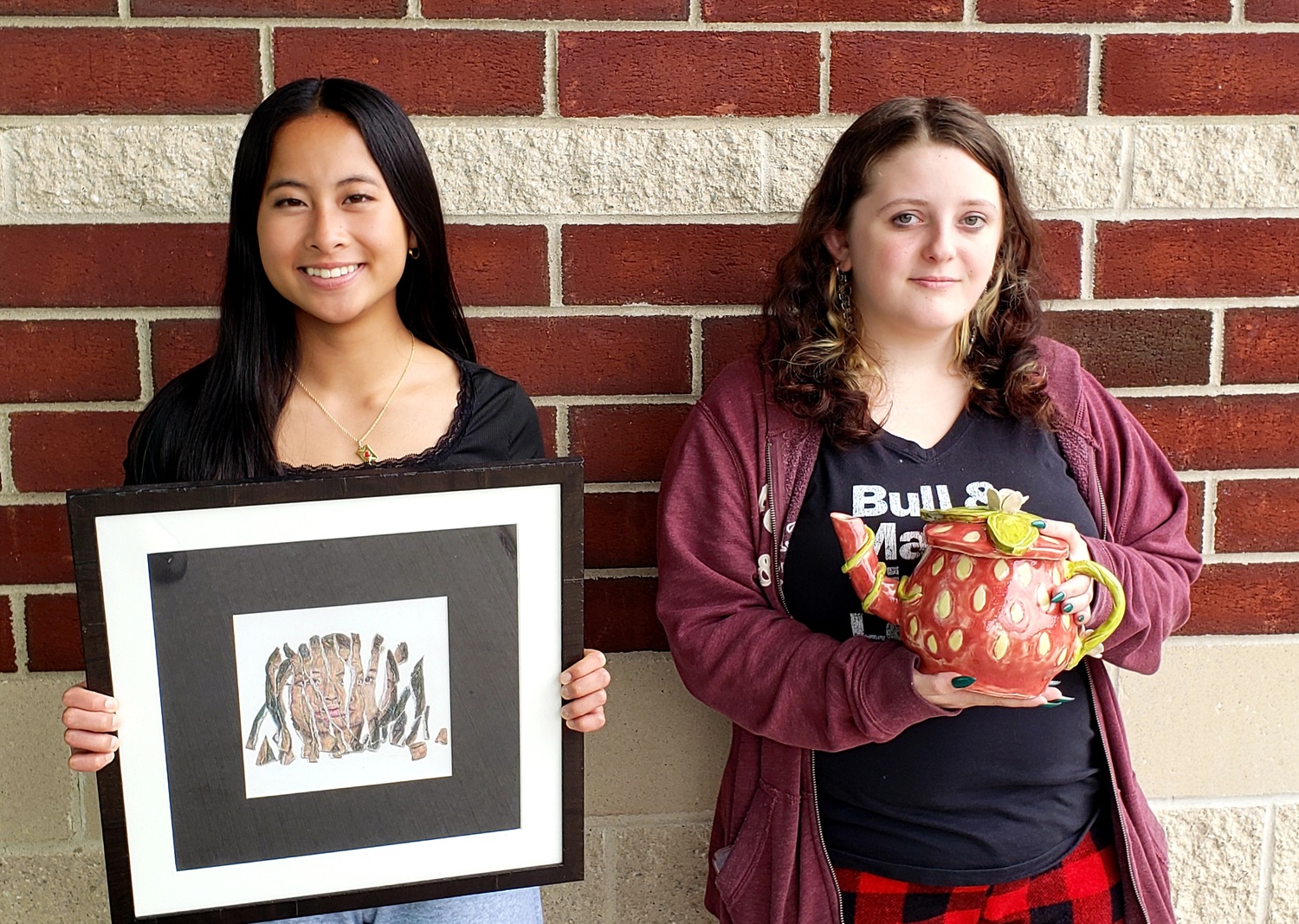 Eastport-South Manor Jr.-Sr. High School seniors Sydney Flores and Gianna D’Alessandro were selected to exhibit at BAFFA’s annual high school juried invitational art exhibit. COURTESY EASTPORT-SOUTH MANOR SCHOOL DISTRICT