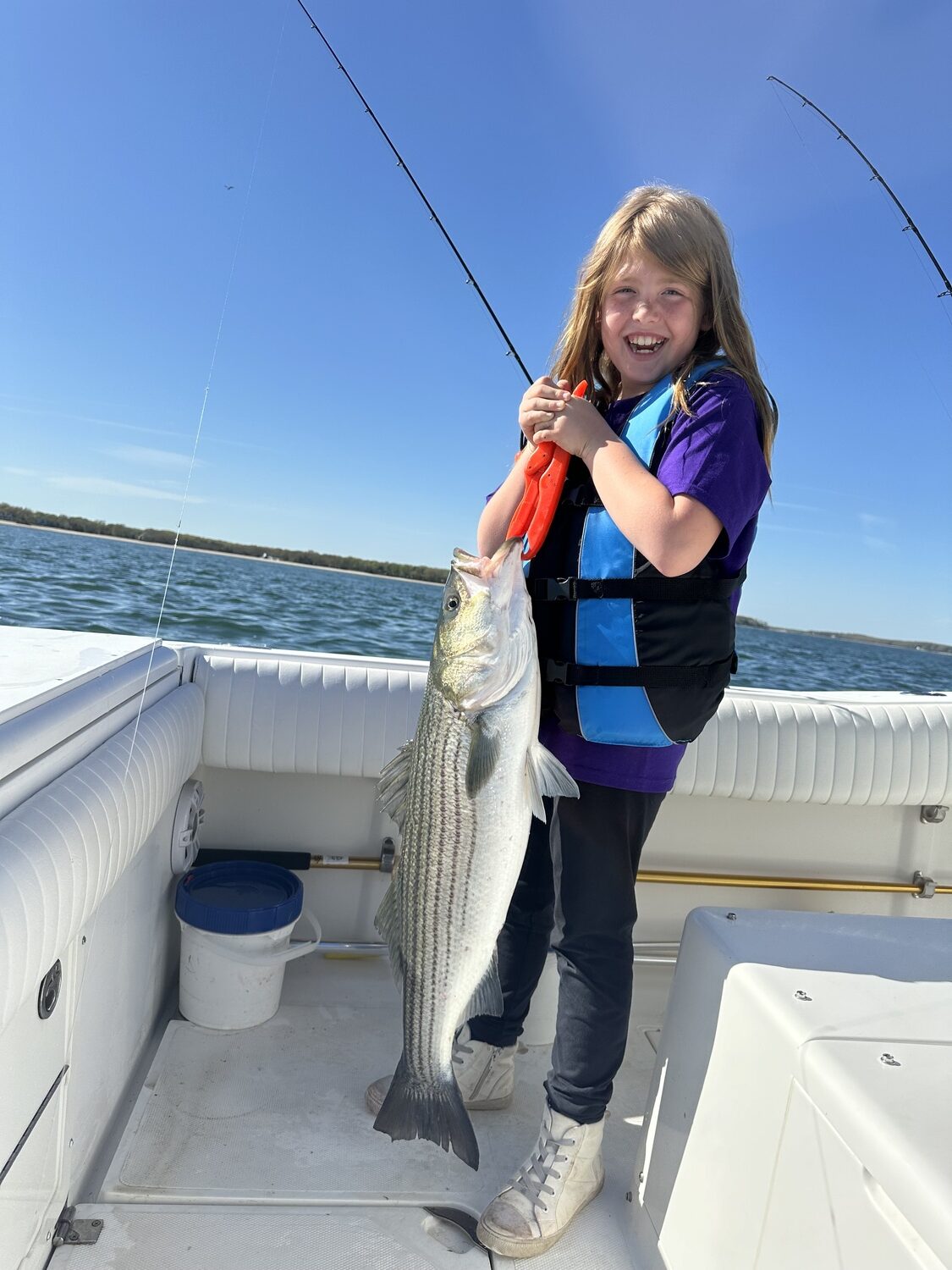 Congratulations to Eleanor McGowin are well deserved for decking her first solo striped bass while fishing in the Peconics with her dad, Bryan, last week.