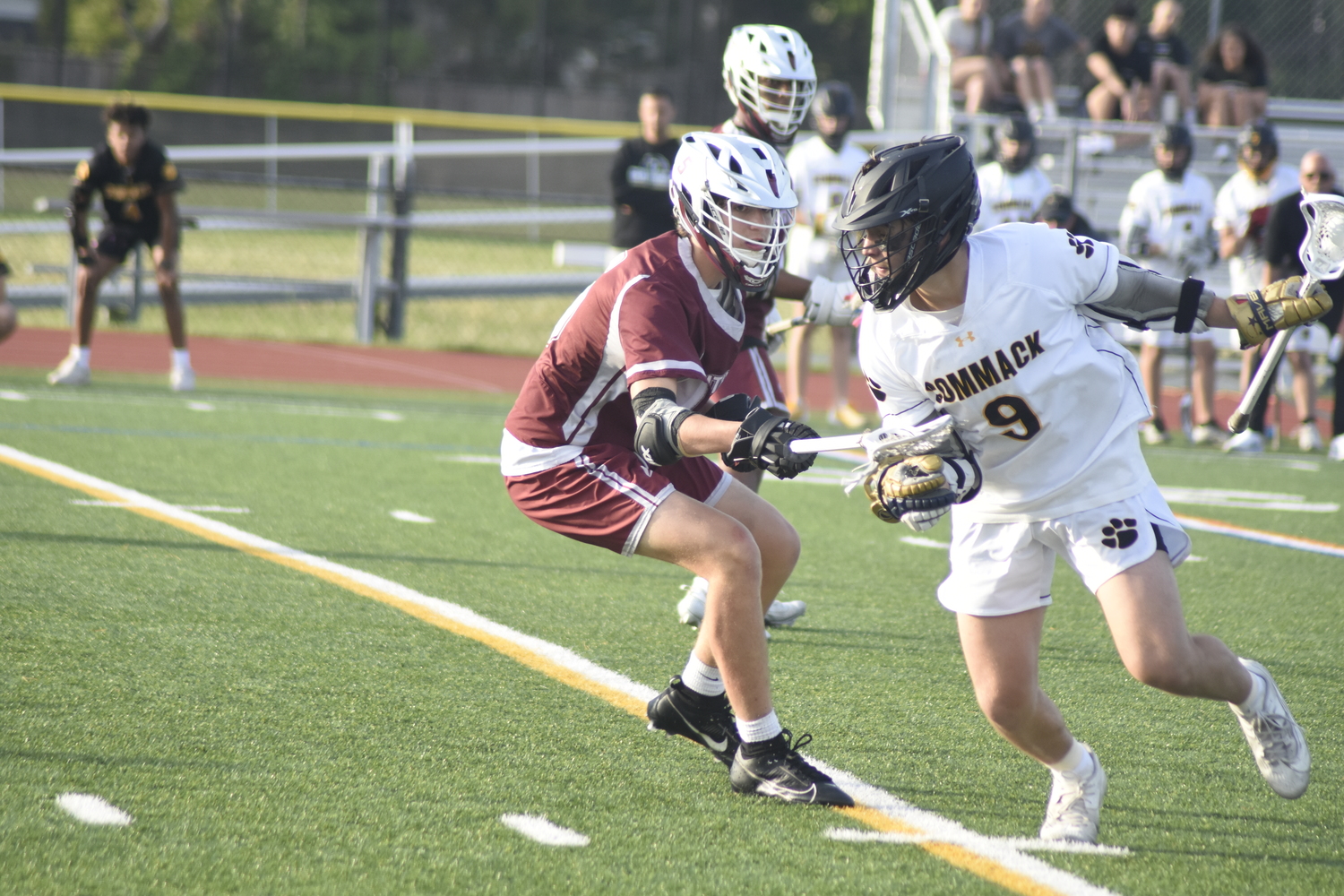 Southampton sophomore Nate Barbour defends against a Commack player. DREW BUDD
