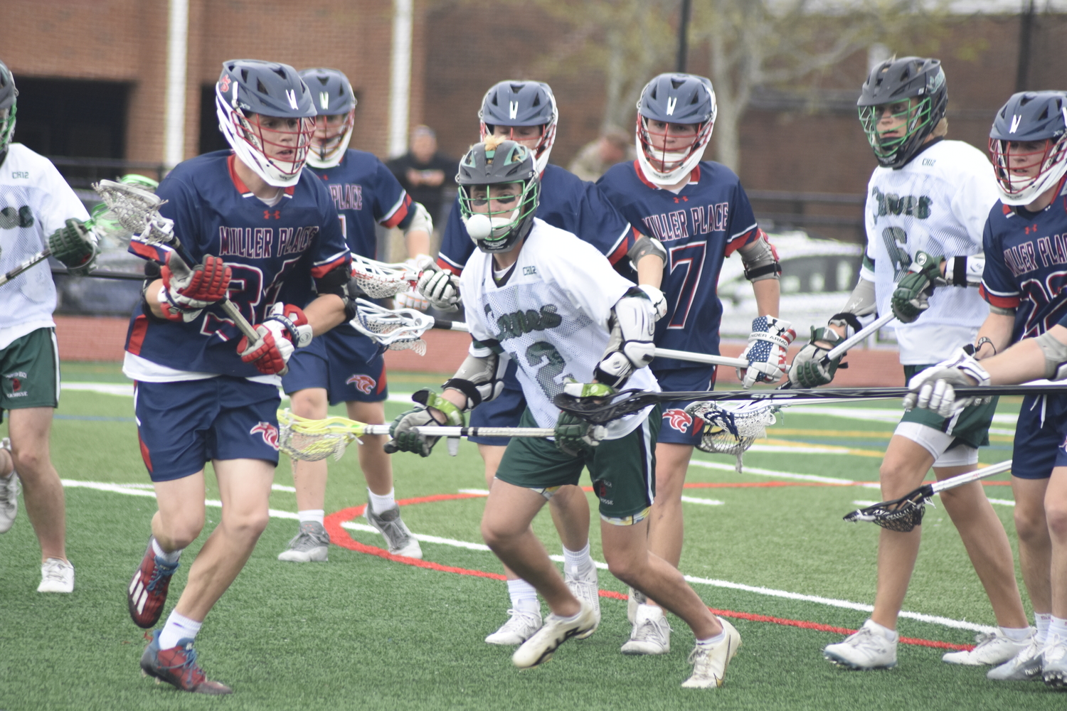 Westhampton Beach senior Heath Sumwalt keeps his eyes on a loose ball.  DREW BUDD