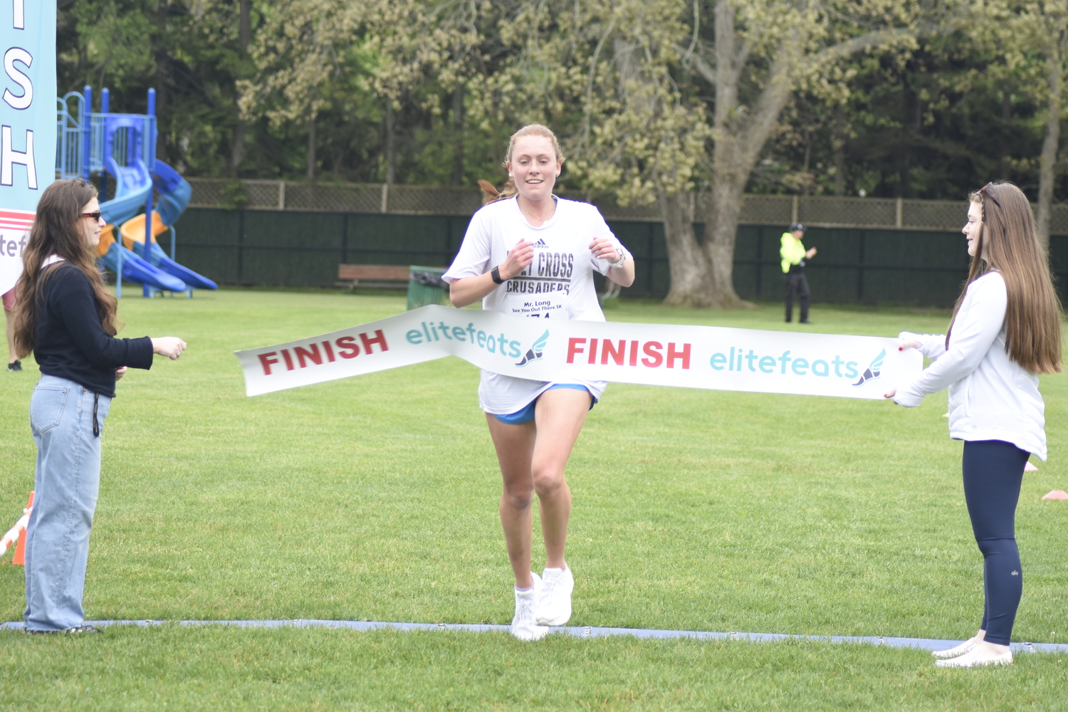 Jackie Amato, an East Quogue Elementary School graduate currently attending Holy Cross University, won the women's champion of Saturday's race.   DREW BUDD
