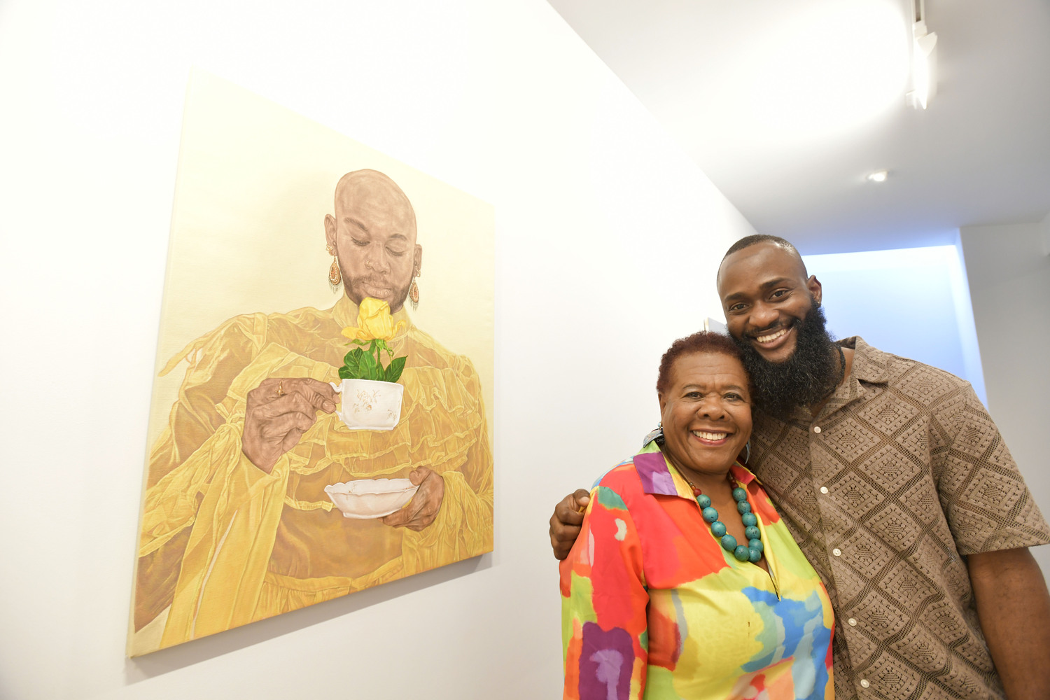 Brenda Simmons with artist Mayowa Nwadike at the opening reception for his exhibit, 