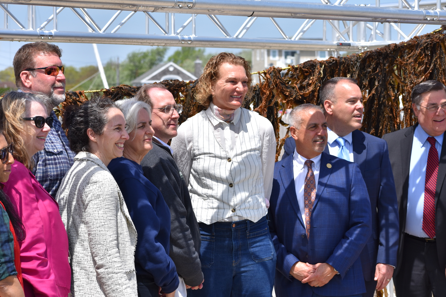 Former pro basketball player turned oyster and kelp farmer Sue Wicks of Violet Cove Oyster Co. on Tuesday in Mastic Beach, celebrating the first permitted commercial kelp harvest in New York State.  BRENDAN J. O'REILLY