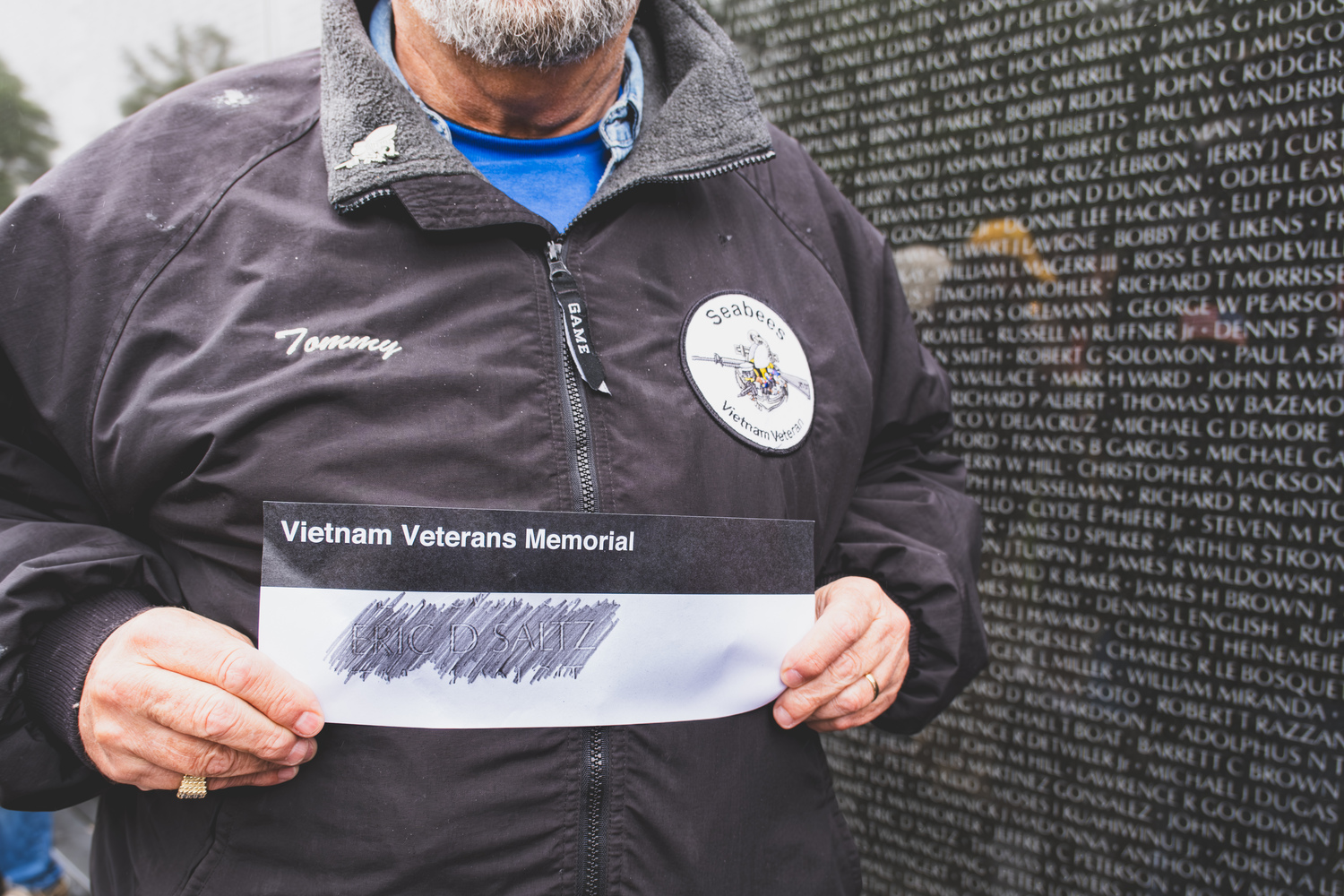 Vietnam veteran Thomas Coughlin makes an etching of a fallen comrade. MARK CHAMBERLAIN