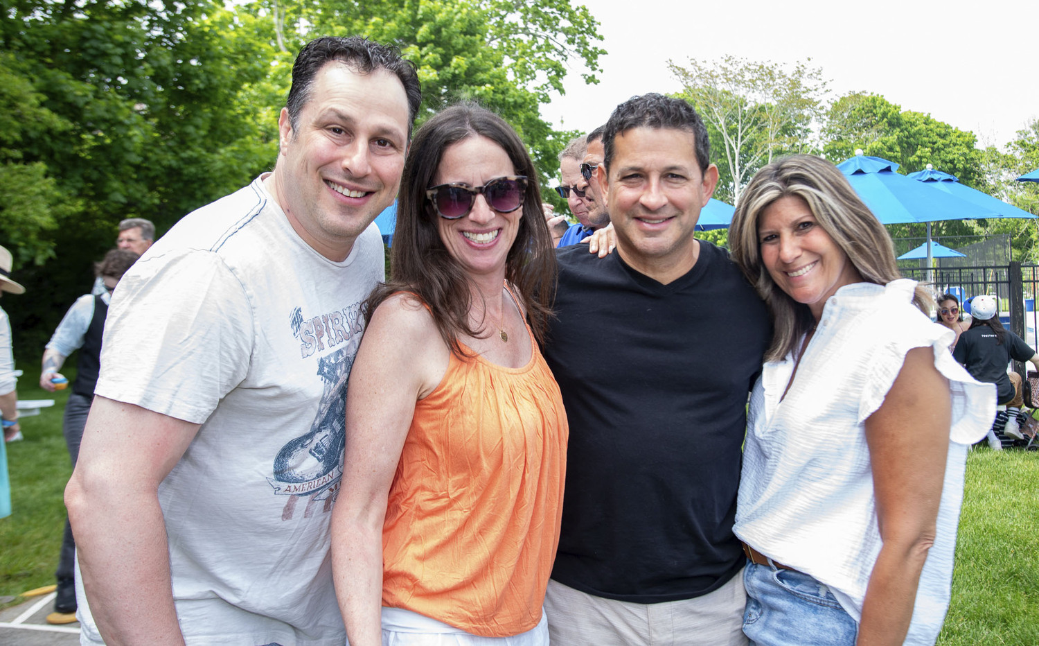 Marc and Jennifer Klein with Michael and Laura Levine at the Southampton Inn's annual Memorial Day barbeque on Sunday.  LISA TAMBURINI