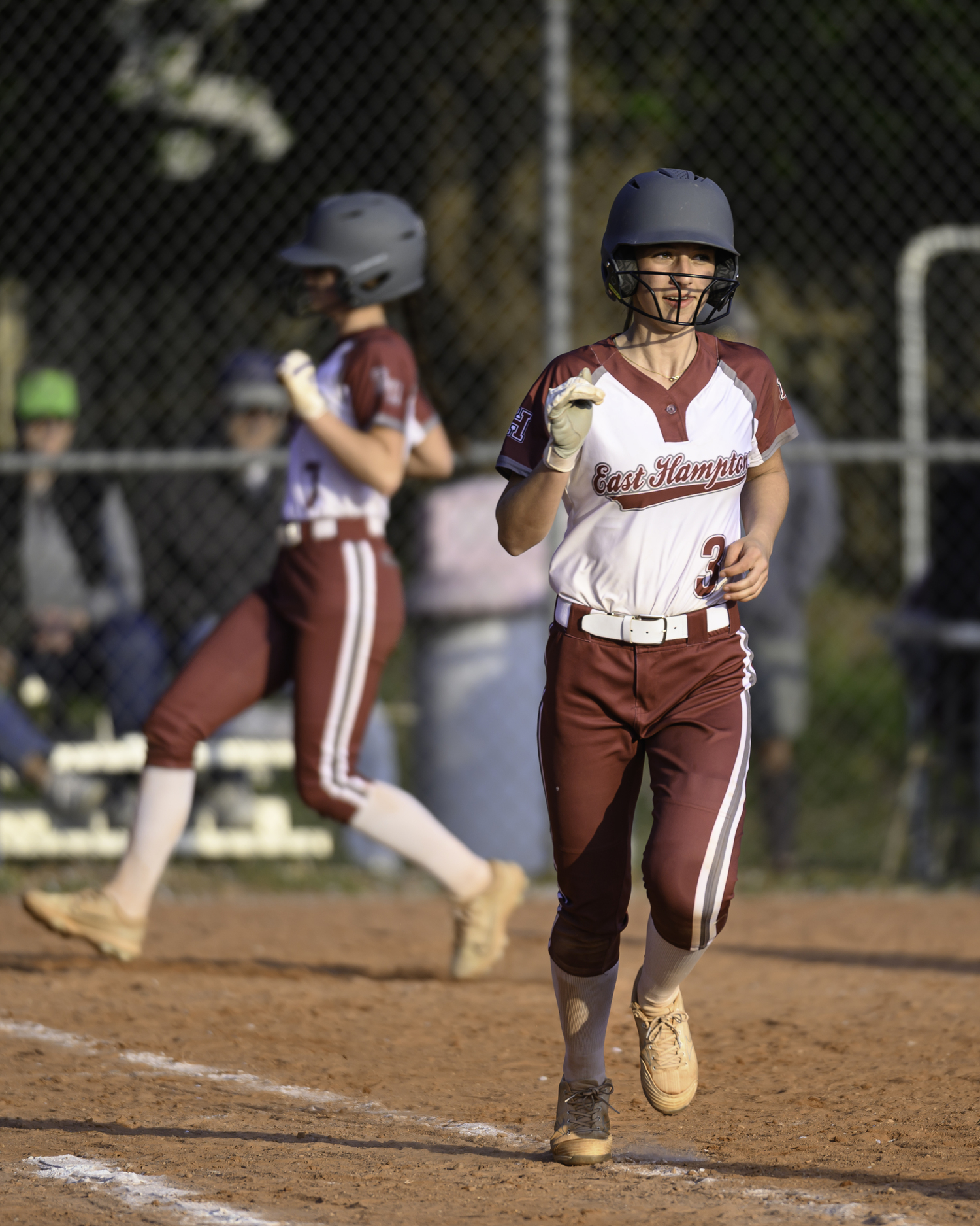 A base hit by Olivia Dodge drives in Colleen McKee.  MARIANNE BARNETT