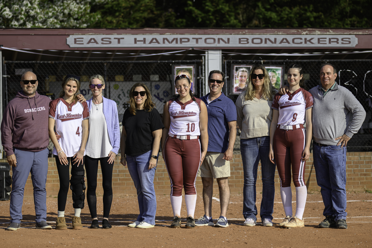 The East Hampton softball team honored its three seniors, Brighton Lys, Katie Kuneth and Gabrielle Payne just prior to Monday’s game against Hauppauge. MARIANNE BARNETT