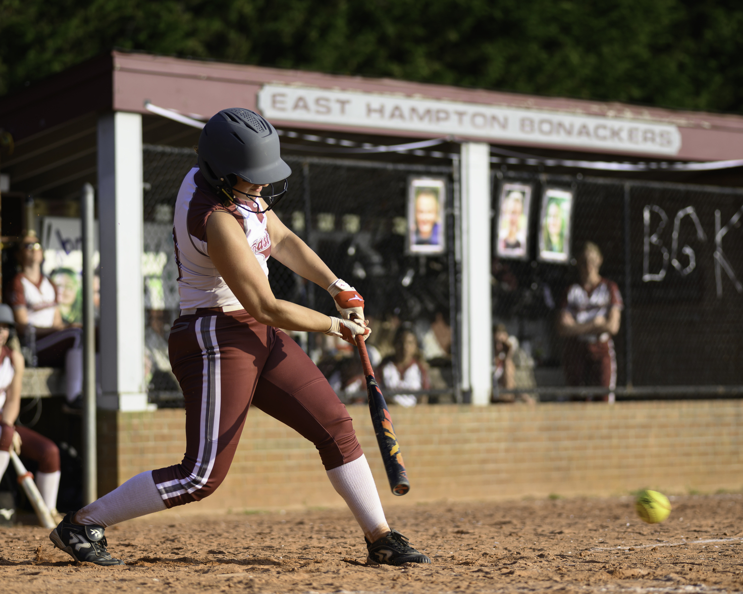 East Hampton junior Susie DiSunno offers at a pitch.  MARIANNE BARNETT