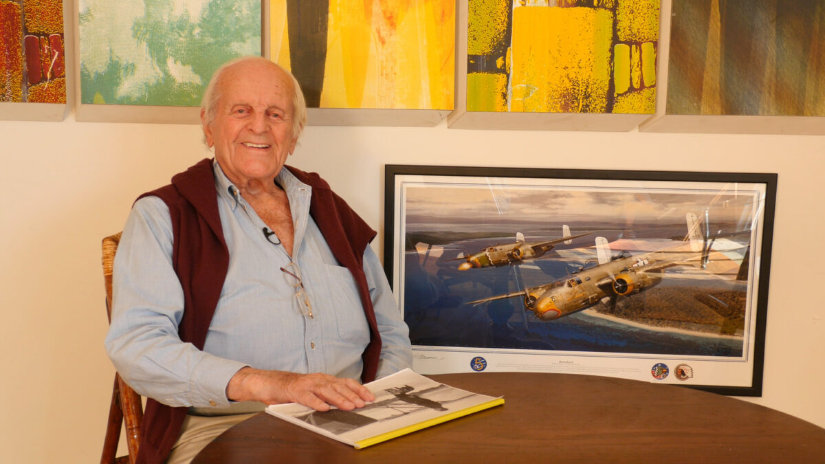 Frazer Dougherty with a B-25 poster during his USA Warrior Stories interview in 2018. COURTESY USA WARRIOR STORIES