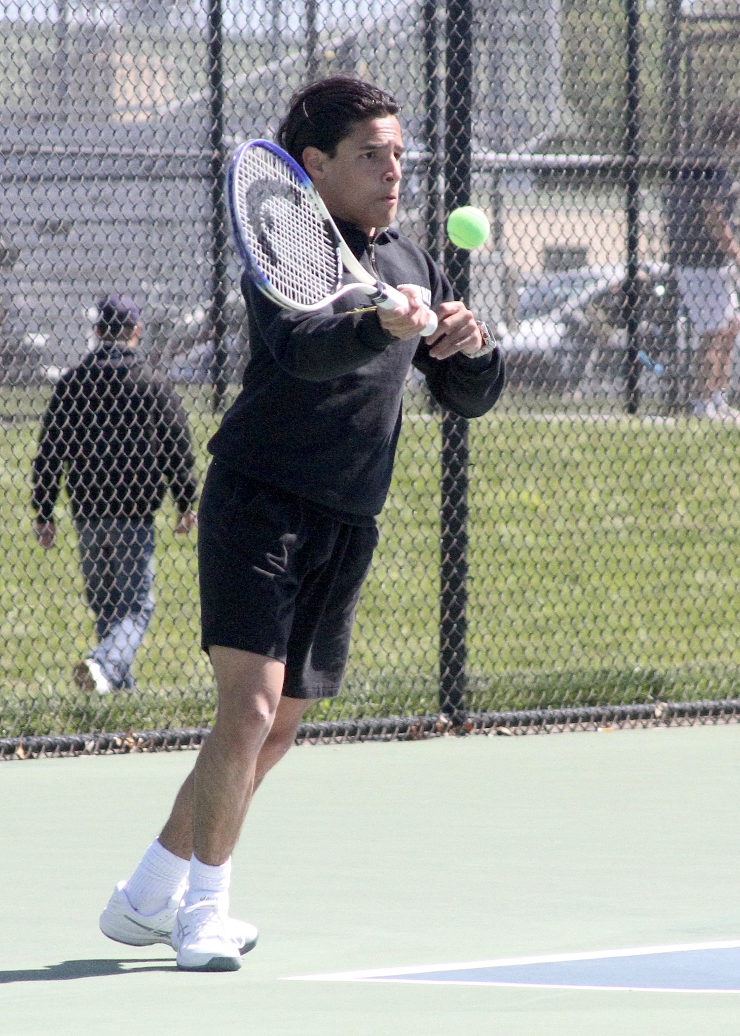 Hampton Bays junior Kevin David Saa Pacheco returns a serve. DESIRÉE KEEGAN