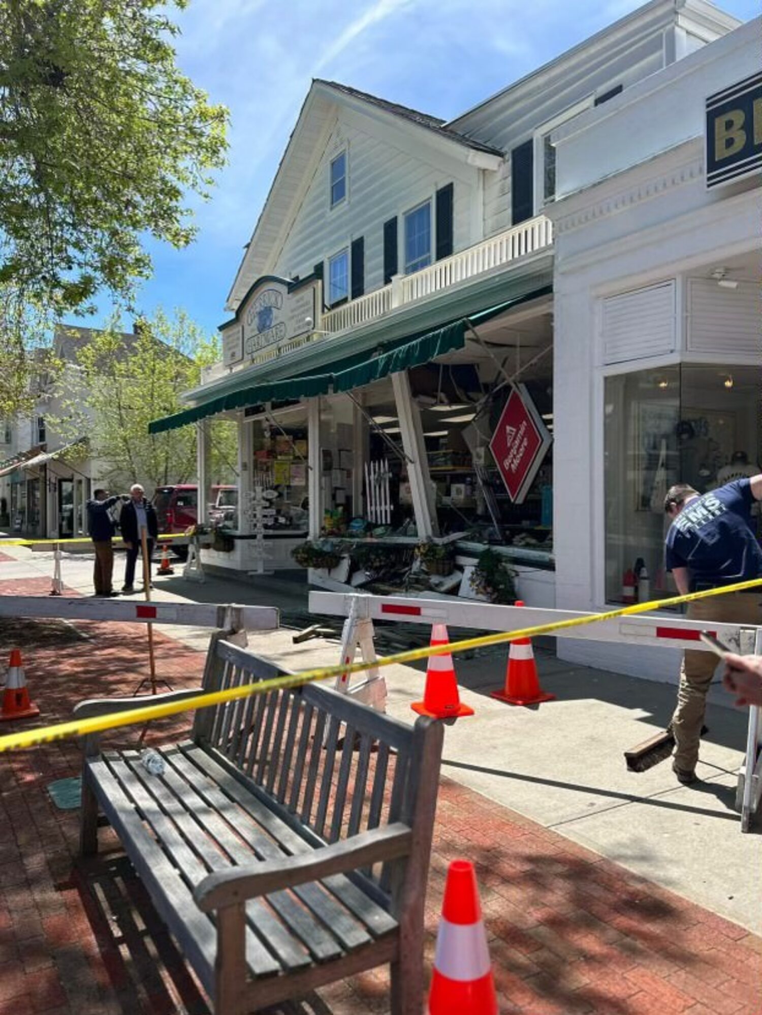 The facade of Herrick Hardware in Southampton Village was badly damaged when an SUV jumped the curb and smashed into the building. CAILIN RILEY