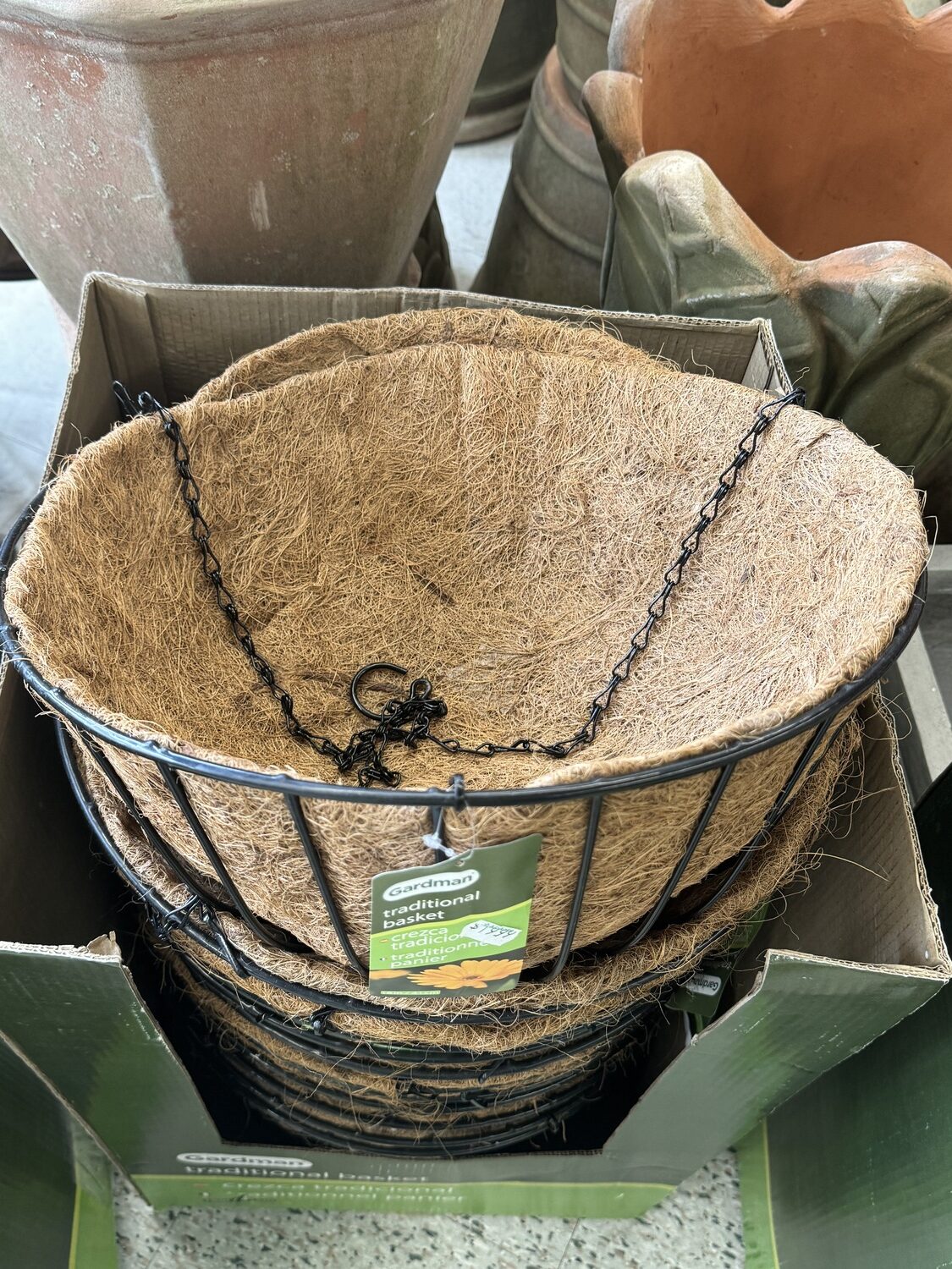 This 18-inch hanging basked has a wire frame with a coir (coconut husk) liner. The liner is porous, allowing for great drainage and air in the soil area and this is a perfect size for an upsize potting later in the summer or one large planting for slow growers that will tolerate a shady situation. ANDREW MESSINGER