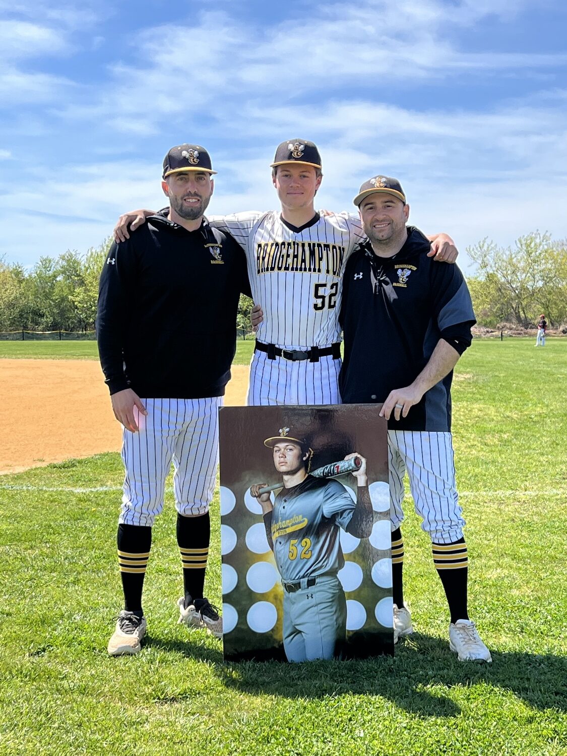 Milo Tompkins was honored as the Bridgehampton/Ross baseball teams lone senior captain prior to playing Amityville on Saturday.  JULIE FOARD