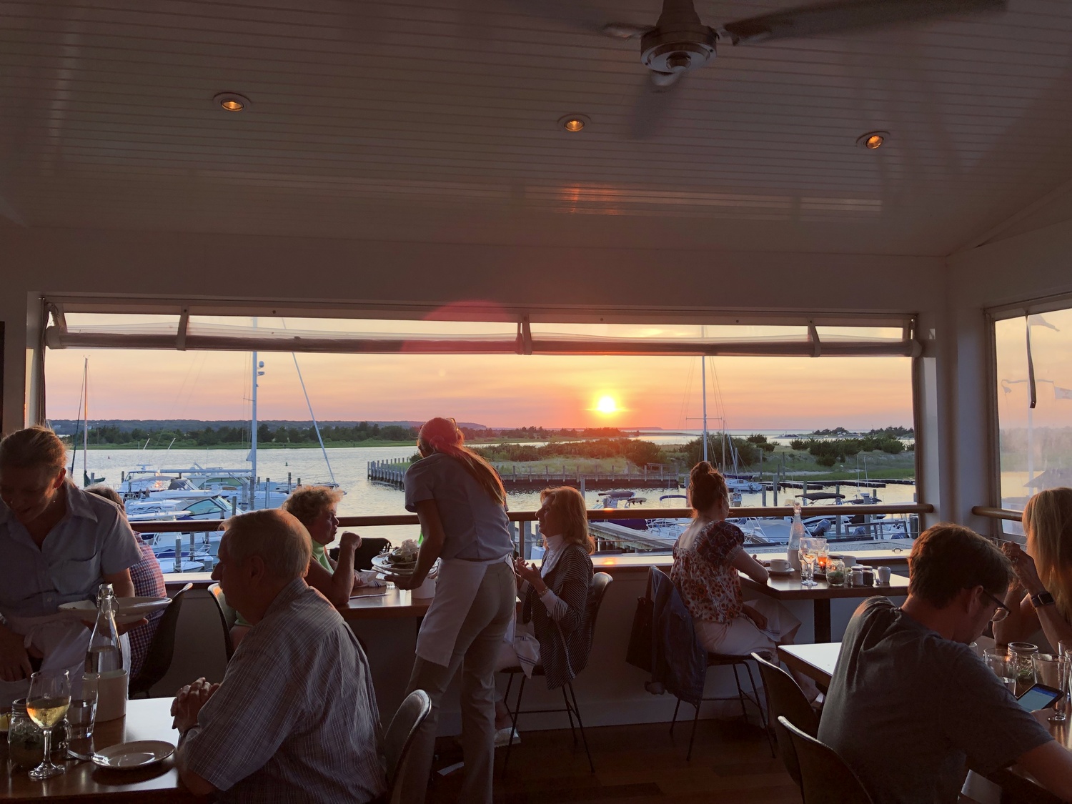 Bostwick's on the Harbor is open for the season with great sunset views over Three Mile Harbor. COURTESY BOSTWICK'S