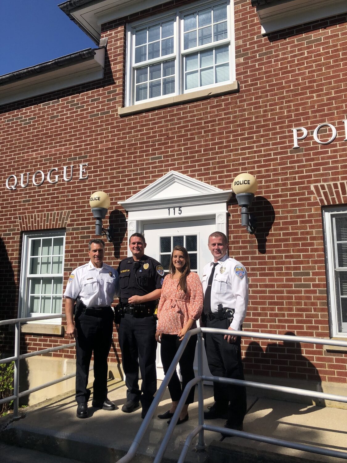 From left, Quogue Police Chief Chris Isola, Sergeant Daniel Bennett, officer Ashleigh Trotta and Lieutenant Daniel Hartman worked together to make sure the Quogue Police Department met the necessary standards to officially become an accredited police department in the state of New York. CAILIN RILEY