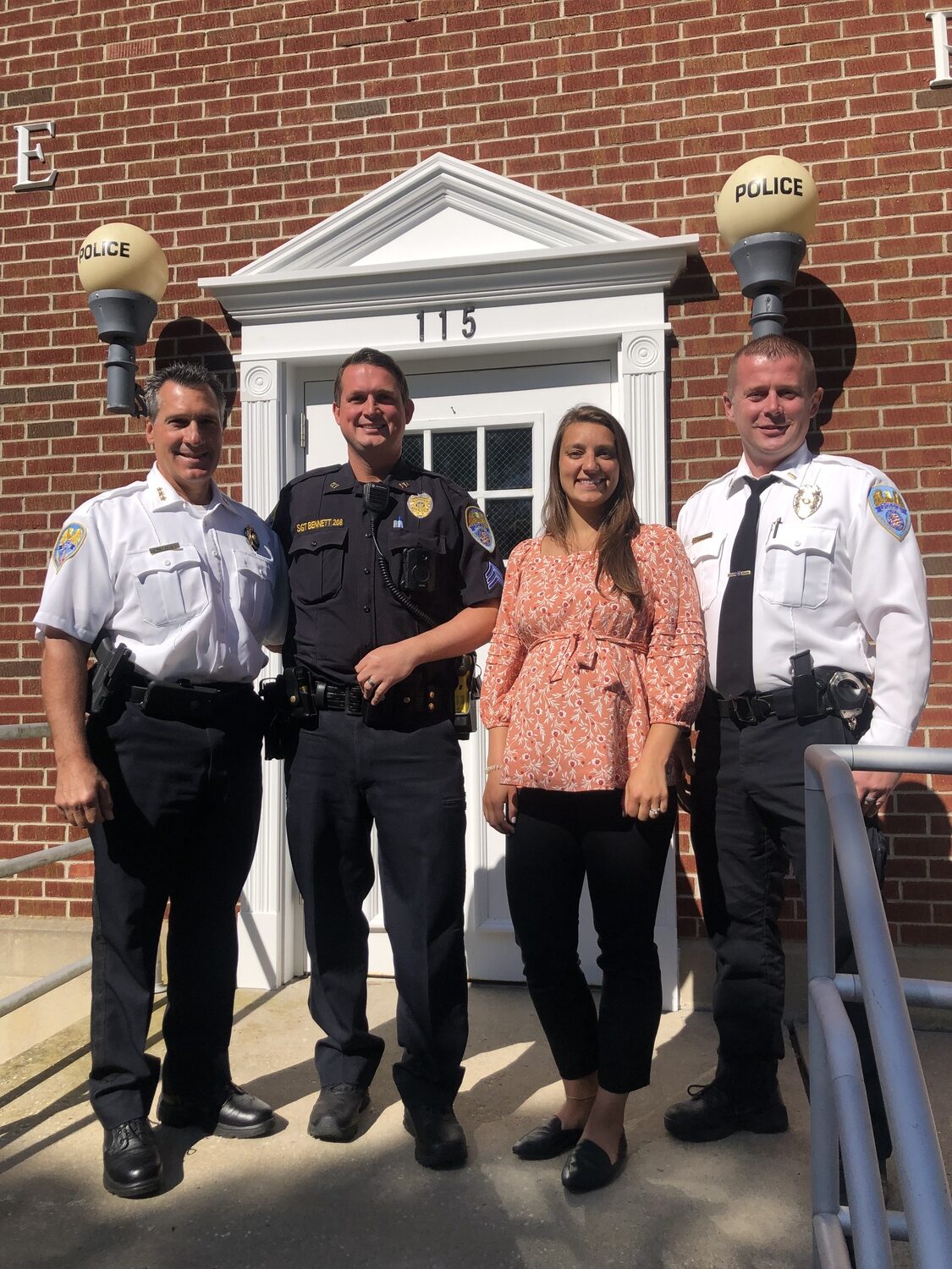 From left, Quogue Police Chief Chris Isola, Sergeant Daniel Bennett, officer Ashleigh Trotta and Lieutenant Daniel Hartman worked together to make sure the Quogue Police Department met the necessary standards to officially become an accredited police department in the state of New York. CAILIN RILEY