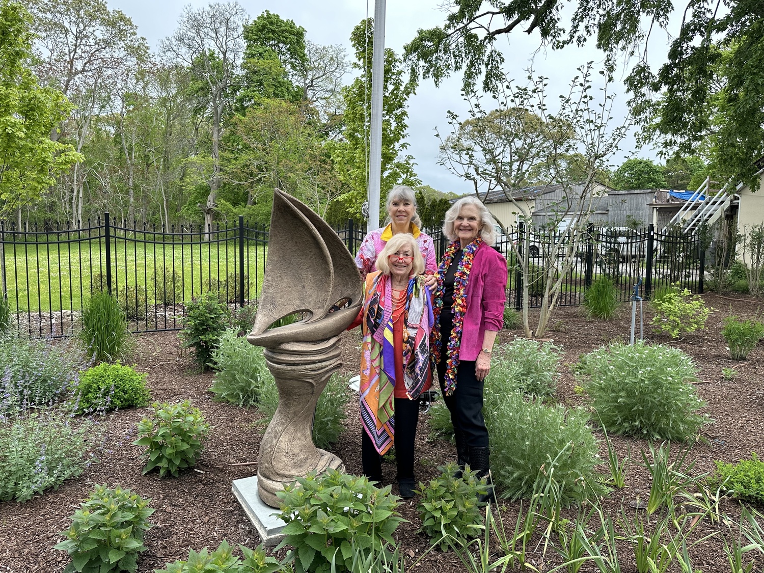 From left to right: Jane H. Macon, Susan von Freddi, Patricia L. Francy with the new sculpture. DAN STARK