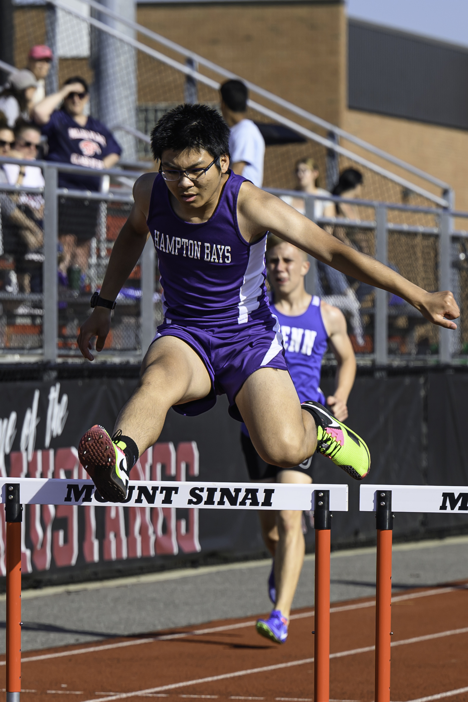 Hampton Bays sophomore Matthew Zheng in the 400-meter hurdles.    MARIANNE BARNETT
