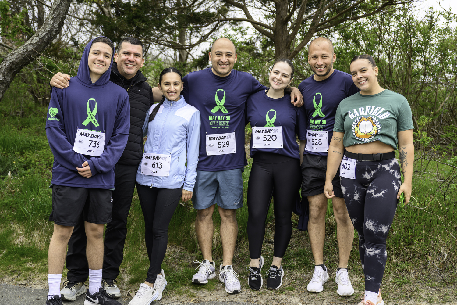 Close to 800 people participated in the third annual May Day 5K at Main Beach in East Hampton on Sunday morning.   MARIANNE BARNETT
