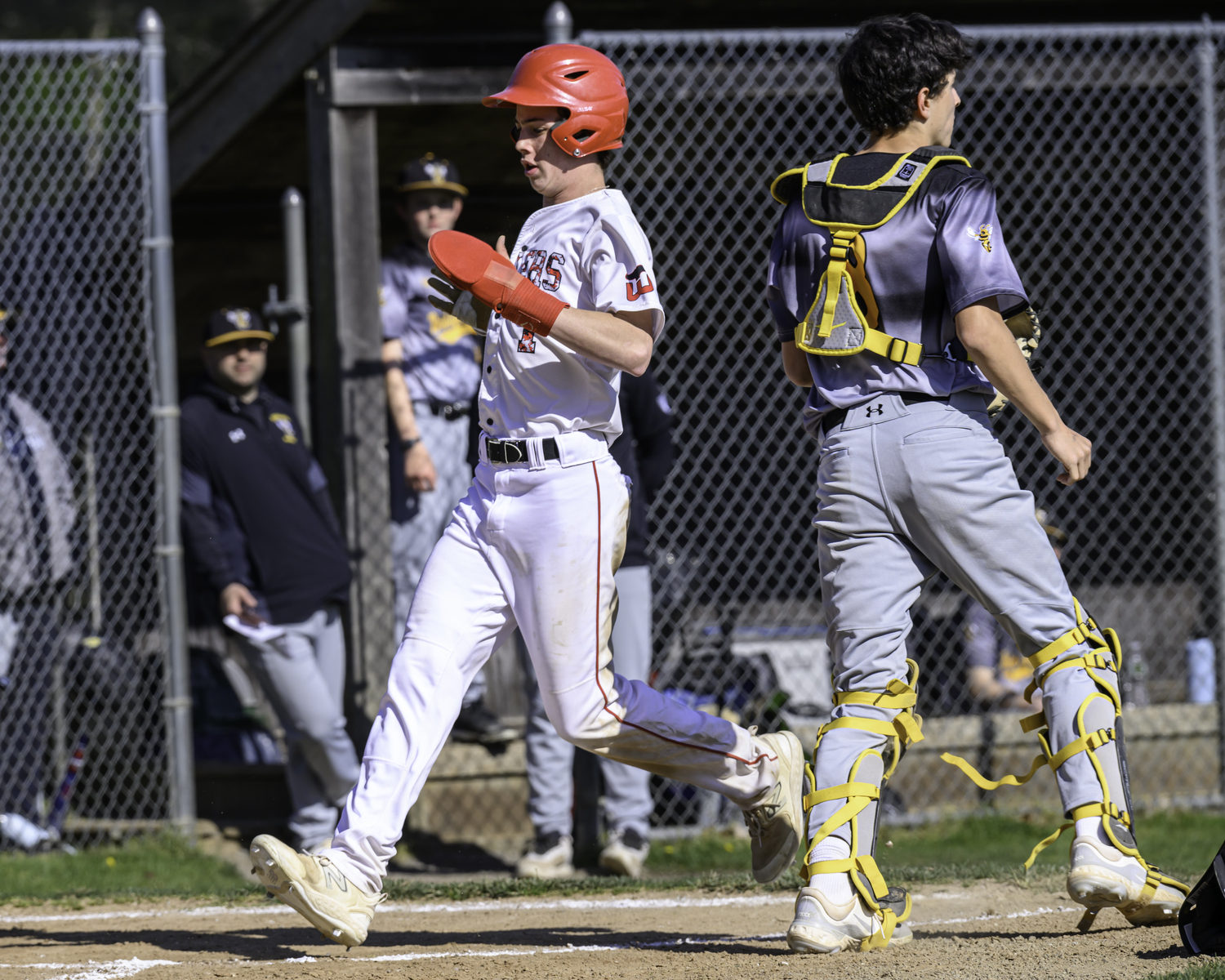 Pierson senior Dom Mancino scores the first of 17 runs in game two of last week's series on May 1.  MARIANNE BARNETT