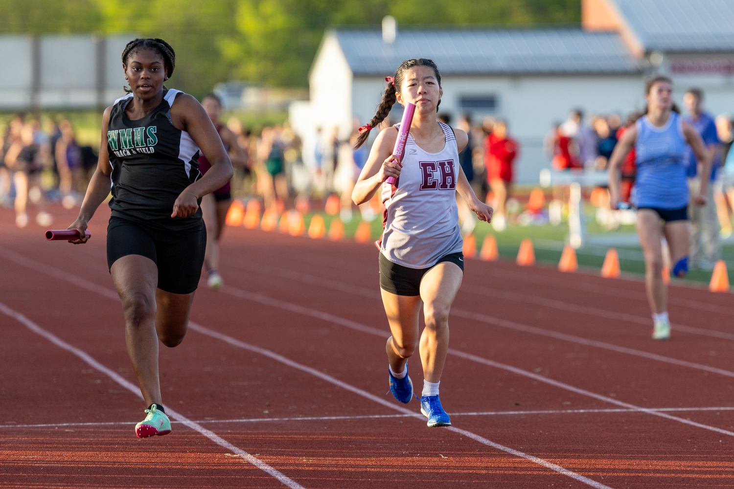 Vicky Chen running the 4x100-meter relay for the Bonackers.  RON ESPOSITO