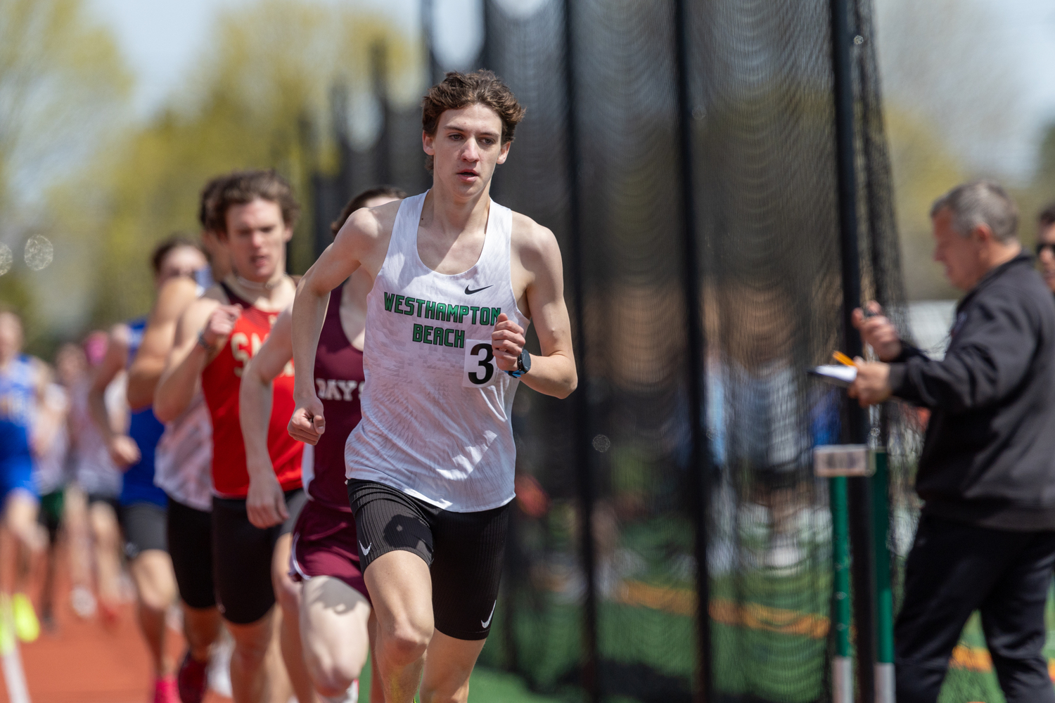 Trevor Hayes, running at the Westhampton Beach Invitational in late April, won the won at last week's county meet.   RON ESPOSITO