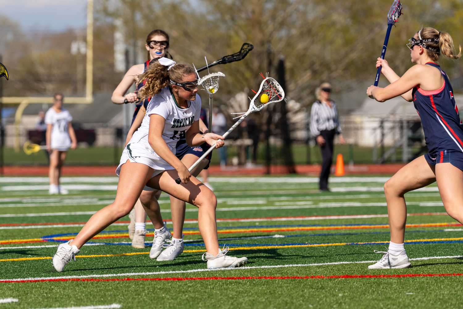 Senior attack Madison Maire makes her way around a defender during Westhampton Beach's 11-5 win over Miller Place April 24. RON ESPOSITO