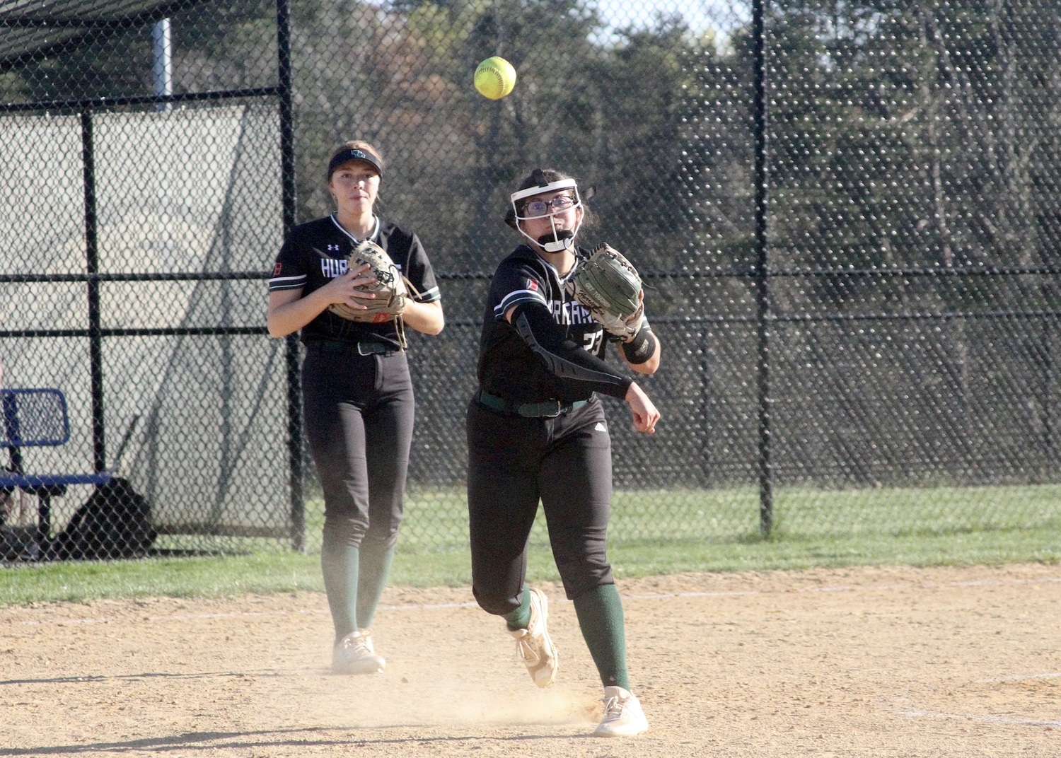 Sophomore starting pitcher Addison Celi tosses the ball to first base for an out. DESIRÉE KEEGAN