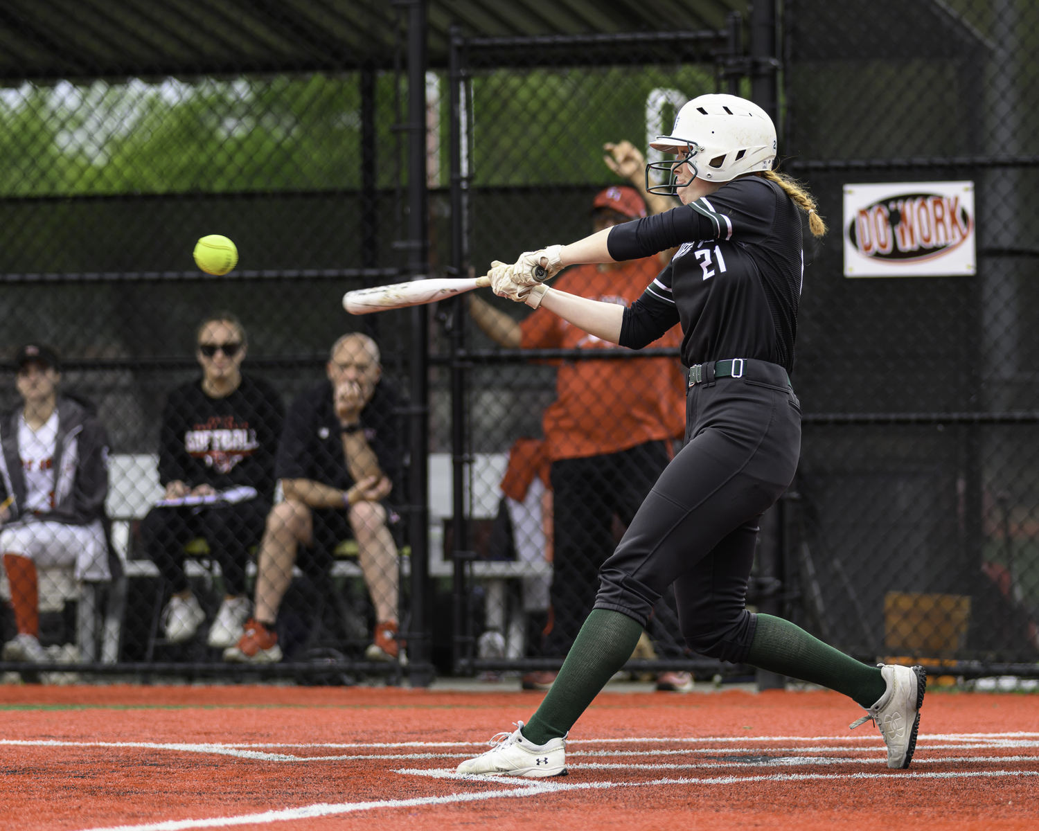 Katie Burke sends a base hit into the outfield.   MARIANNE BARNETT