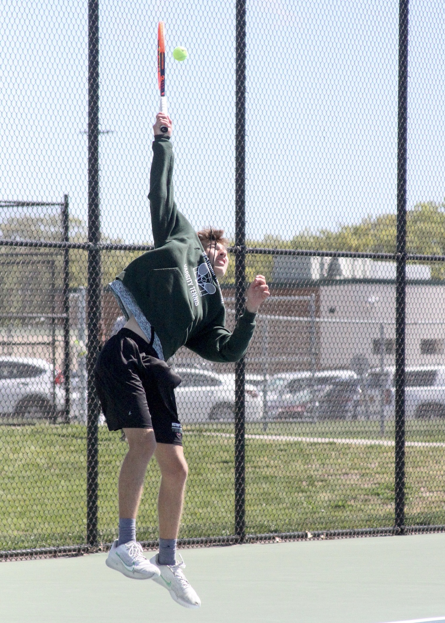 Westhampton Beach sophomore Bryce Groth  serves up an ace. DESIRÉE KEEGAN