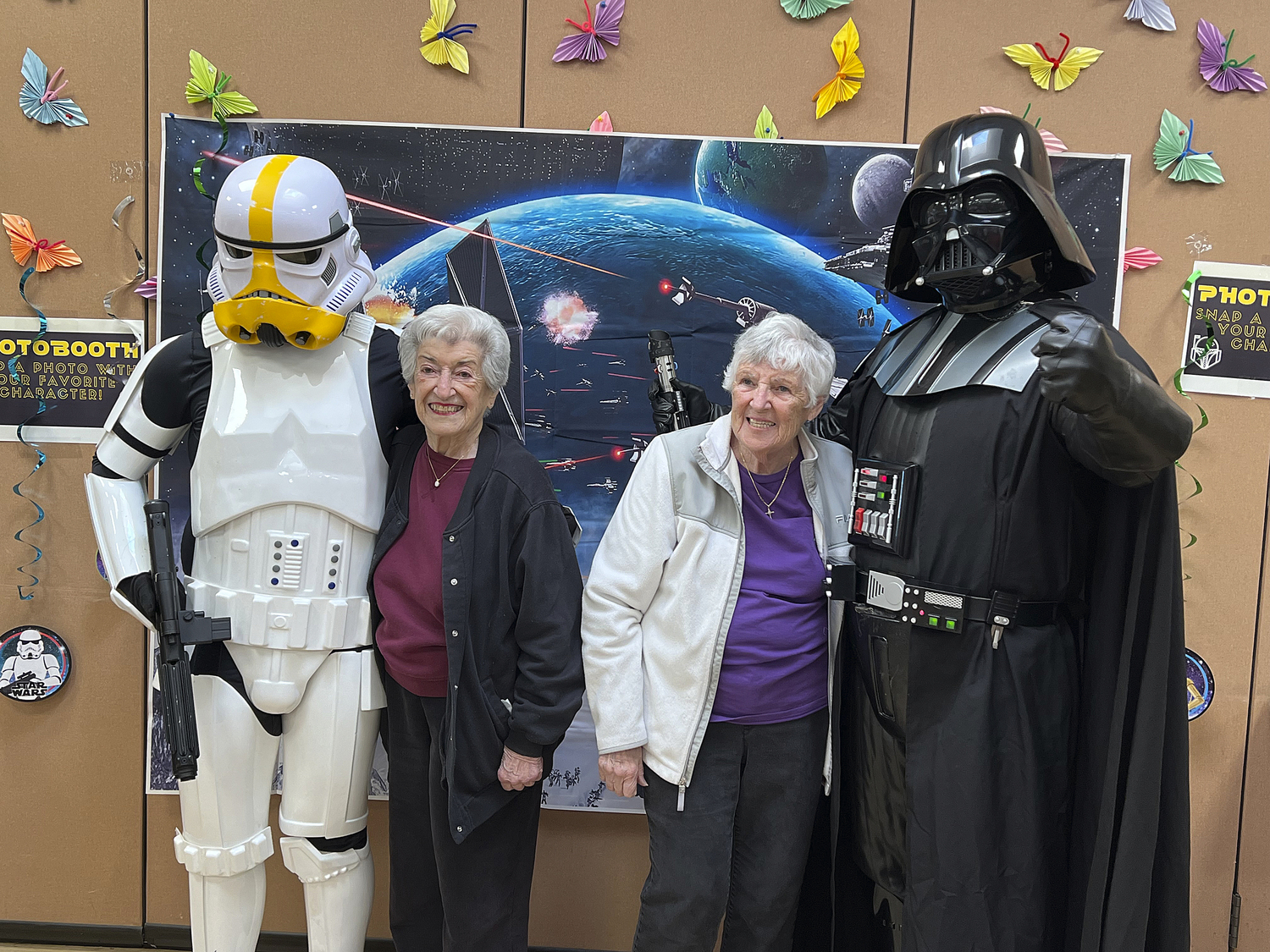 Barbara Bedell and Mella Burke take a walk on the Dark Side at the Town of Southampton Youth Bureau’s Youth Advisory Committee's May the 4th pancake breakfast to raise money for future community service projects on Saturday  at the Hampton Bays Community Center.  DANA SHAW