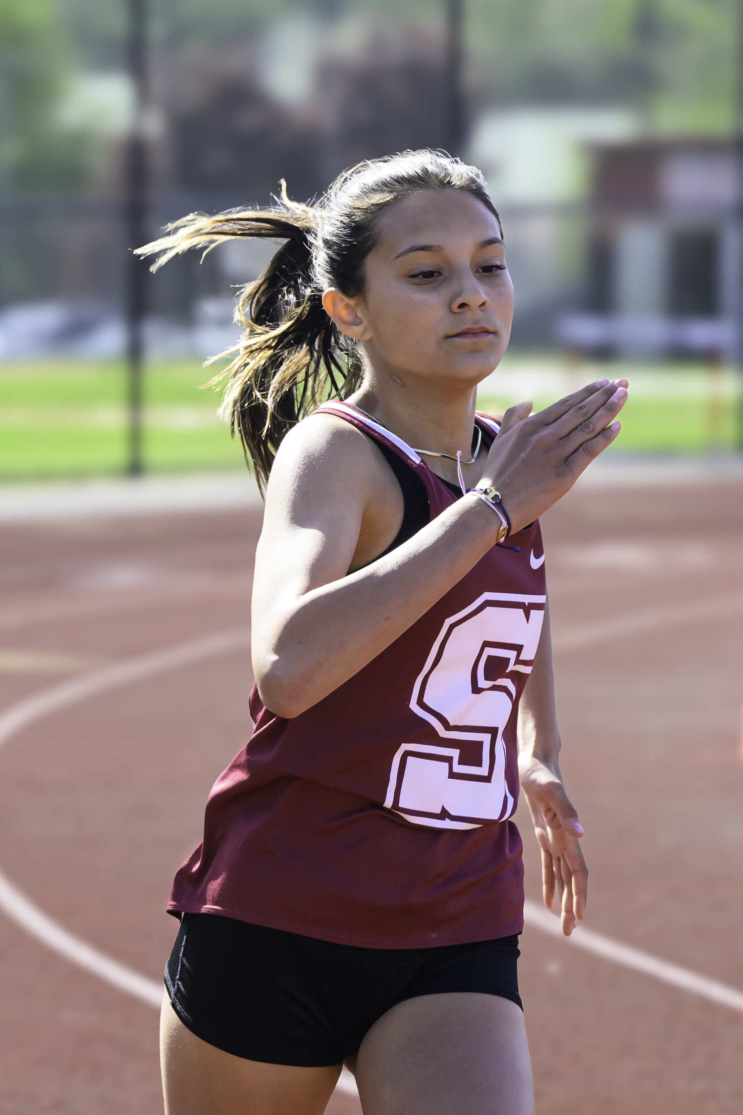 Yessenia Flores ran a personal best in the 400-meter dash.   MARIANNE BARNETT