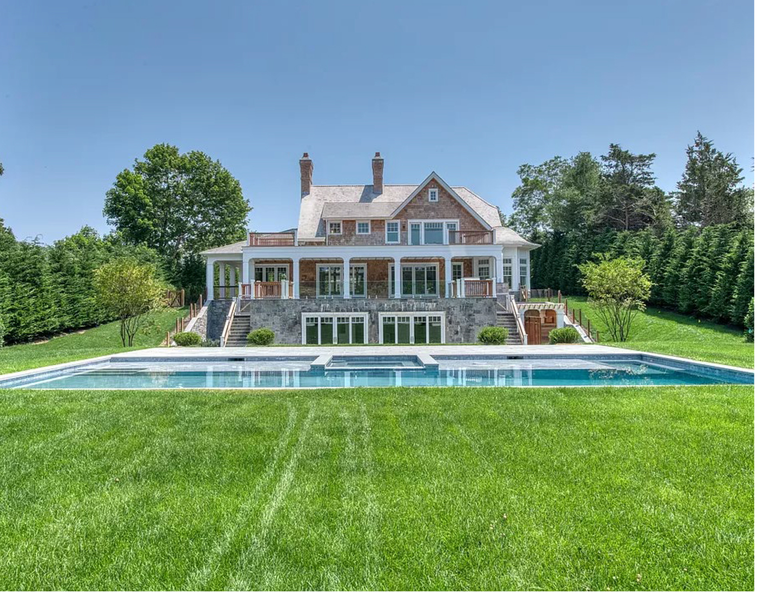 The same house, as built, from the rear with a lower level at ground level. EAST HAMPTON TOWN