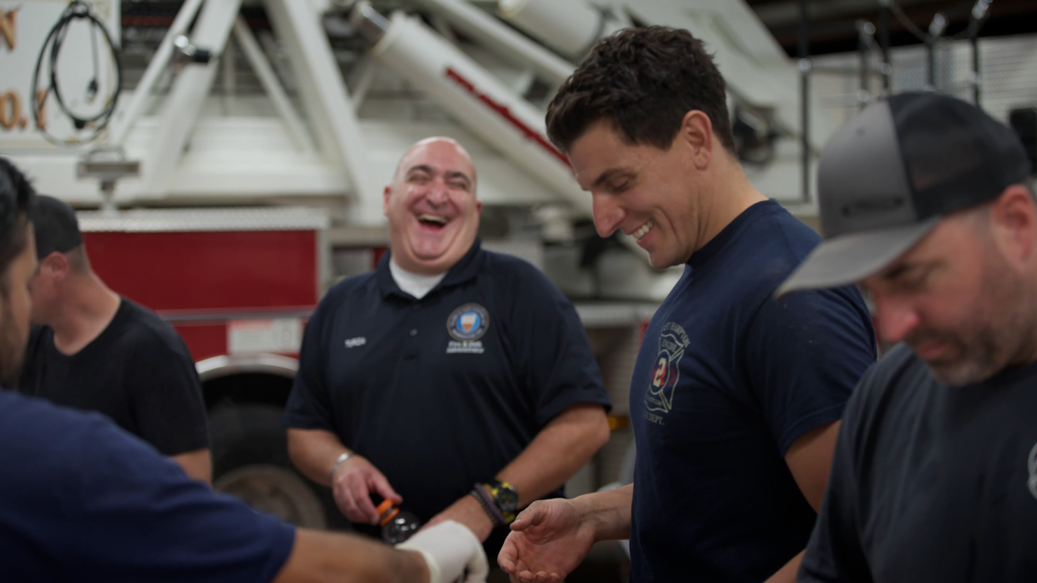 East Hampton Fire Department volunteer Brian Stanis and Emergency Services Administrator Gerry Turza in a recruitment video produced by the village to attract new volunteers.