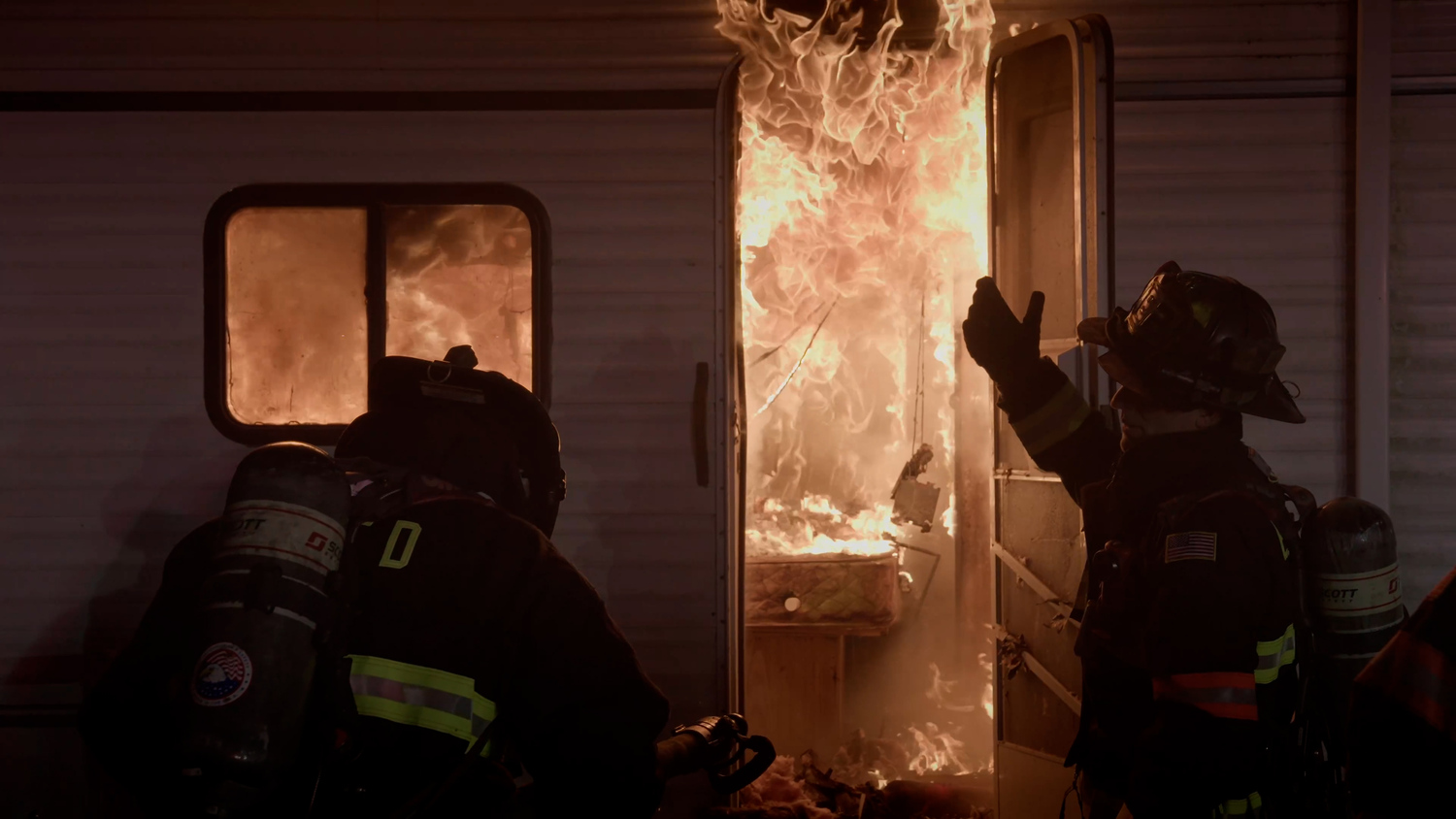 East Hampton Fire Department firefighters battle a blaze in a training exercise depicted in a recruiting video produced by East Hampton Village to attract new volunteers.