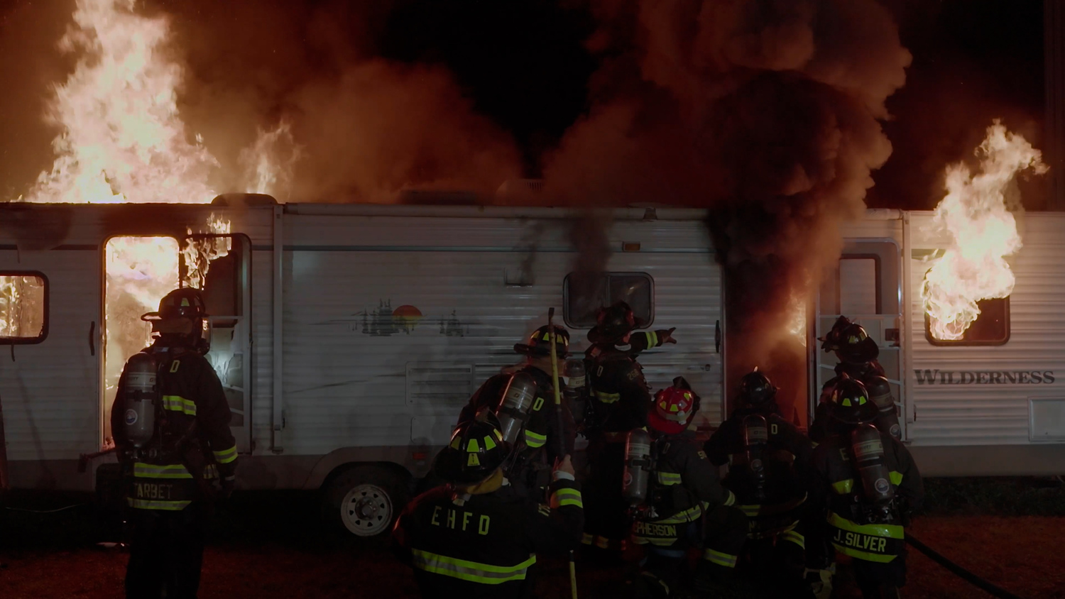 East Hampton Fire Department firefighters battle a blaze in a training exercise depicted in a recruiting video produced by East Hampton Village to attract new volunteers.