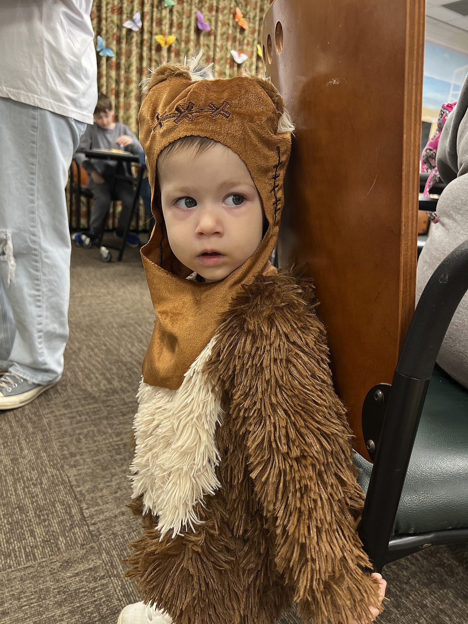 Young Ewok Jayelle Dulpon keeps an eye on Darth Vader and the Stormtroopers at the Town of Southampton Youth Bureau’s Youth Advisory Committee's May the 4th pancake breakfast to raise money for future community service projects on Saturday  at the Hampton Bays Community Center.  DANA SHAW
