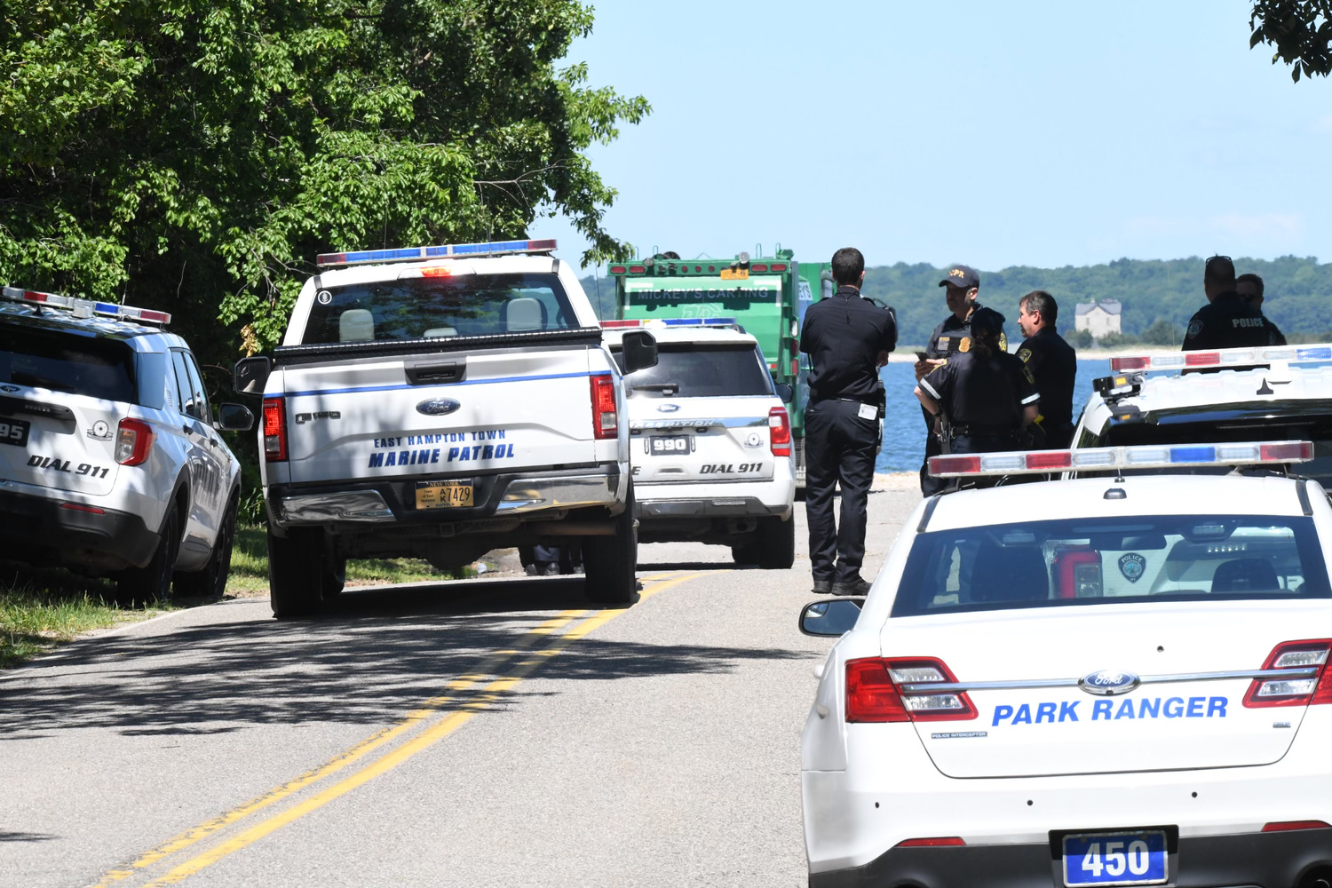 Sag Harbor Harbor Masters, Suffolk County Park Rangers, and East Hampton Town Marine Patrol and Police were on the scene of a near-drowning at Cedar Point County Park on Saturday. DOUG KUNTZ