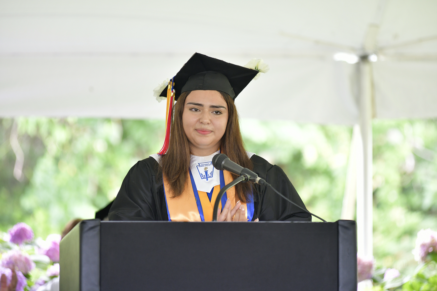 Valedictorian Kimberly Villa delivers her speech.