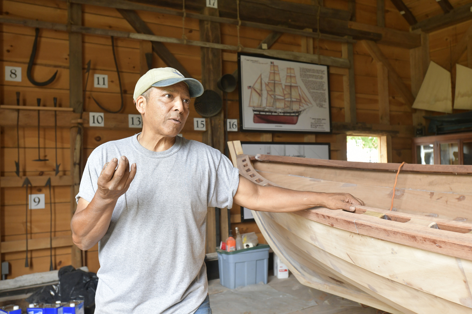 Keith Phillips at work on the Nowedonah at the Southampton Historical Museum.  DANA SHAW