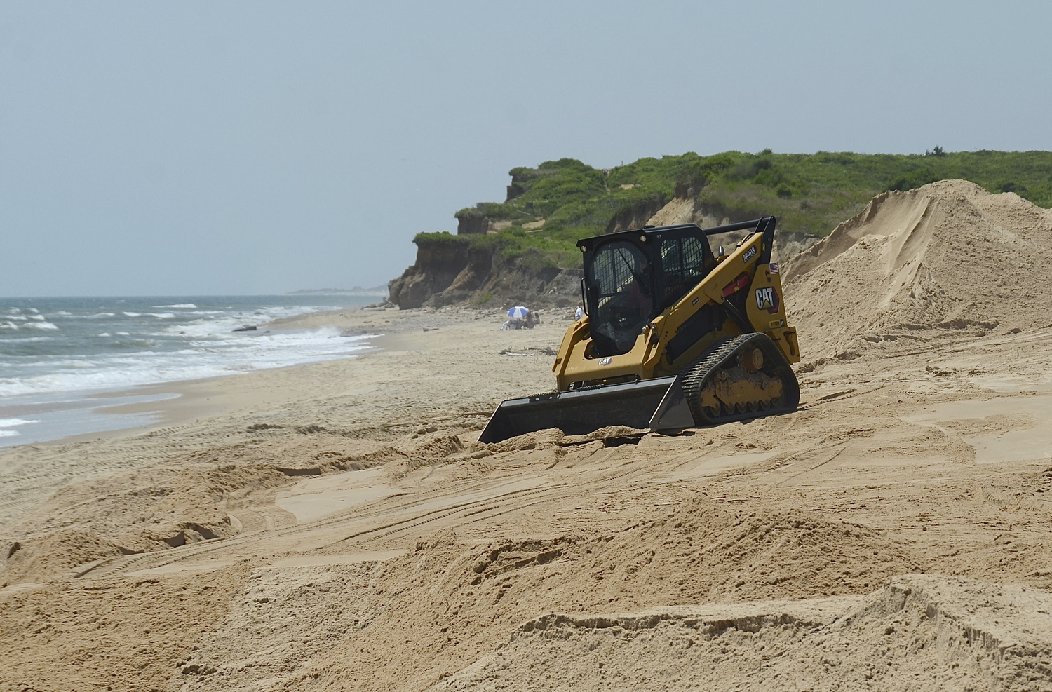 A two-phase beach and dune restoration project at the popular Ditch Plains Beach in Montauk started on Monday, several months after three winter storms  decimated the beach there.  KYRIL BROMLEY