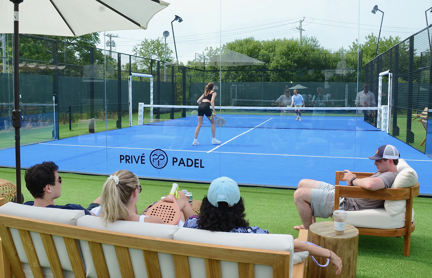 Padel is played in doubles on a 10-meter-by-20-meter court with a serve that is always underhand and hit below waist level. Unlike pickle ball or tennis, padel courts are completely enclosed, and if the ball hits the wall around the court after bouncing on the ground, it is still in play, keeping the game fast paced, and simple for beginners.  KYRIL BROMLEY