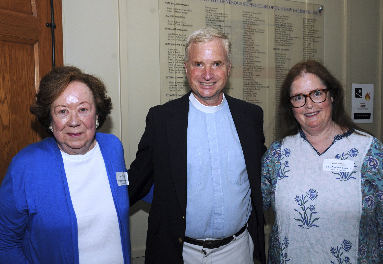 Anchor Society Board Member Anne P. Thomas,St. Luke's Church Rector Reverend Dr. Benjamin A. Shambaugh and Anchor Society Founder and Board Chair Bess Rattray at the Society's summer social at St. Luke's Episcopal Church in East Hampton on Saturday.   RICHARD LEWIN