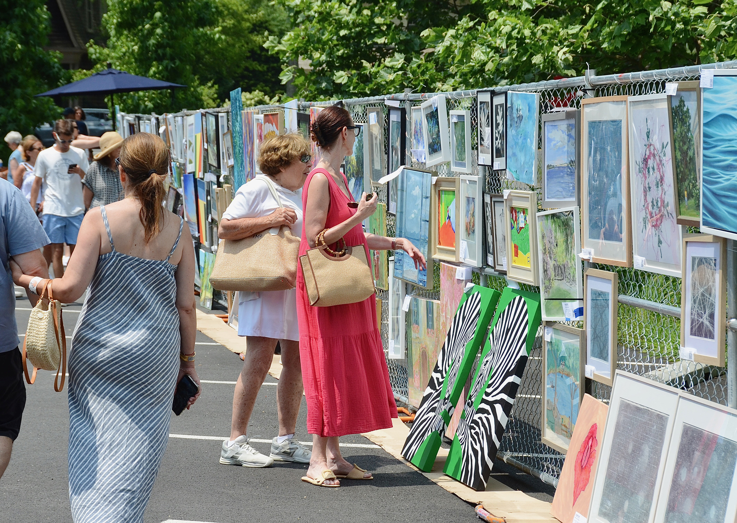 Guild Hall hosted its annual Clothesline Art Sale on Saturday.  The Clothesline art Sale provides accessible artwork to the community while supporting local artists. Throughout its history, participants have included Alfonso Ossorio, James Brooks, John Little, Jackson Pollock, Lee Krasner, Elaine and Willem de Kooning, and many more.   KYRIL BROMLEY